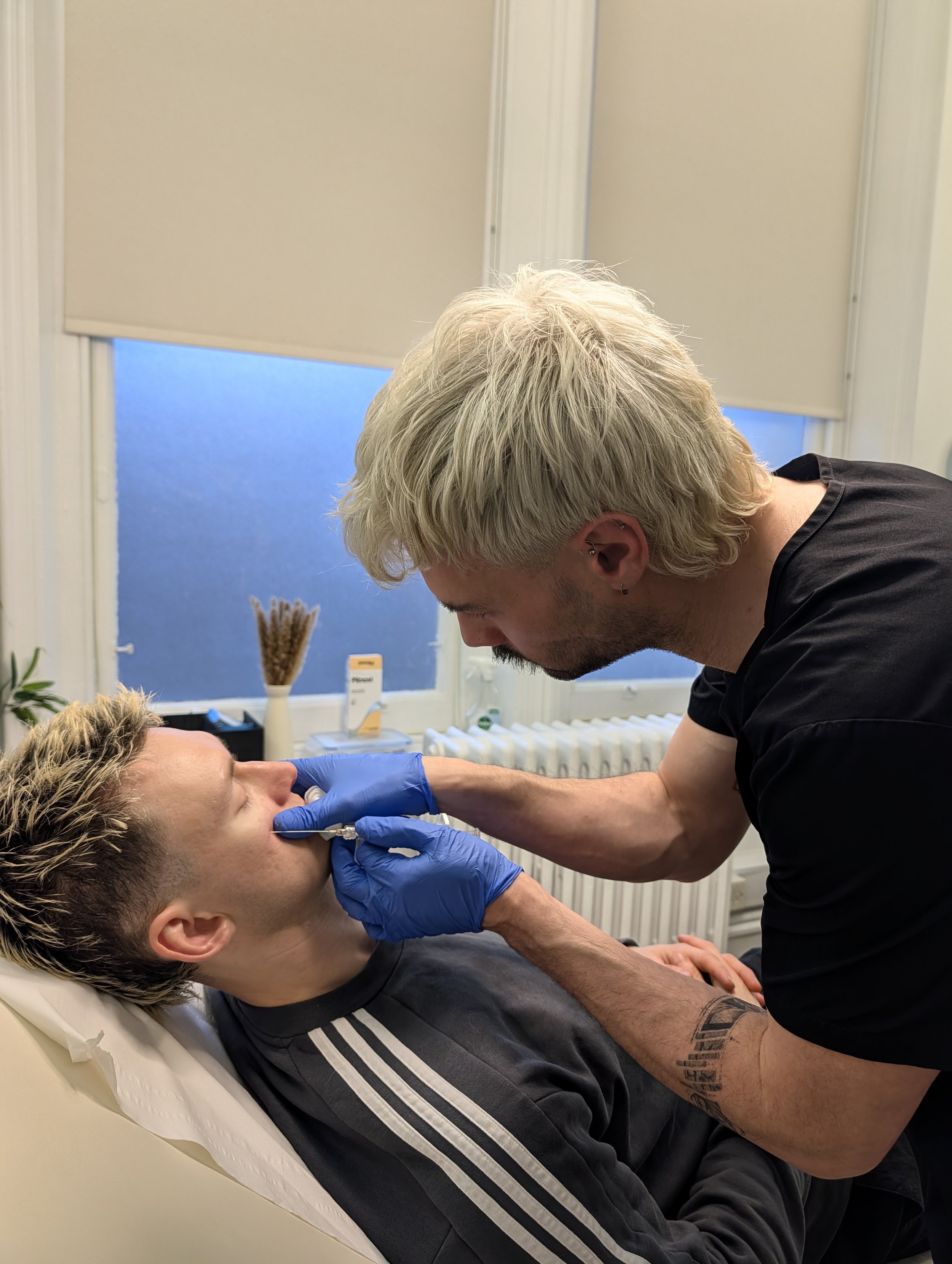 Dr Andy injecting polynucleotides in Mancherster