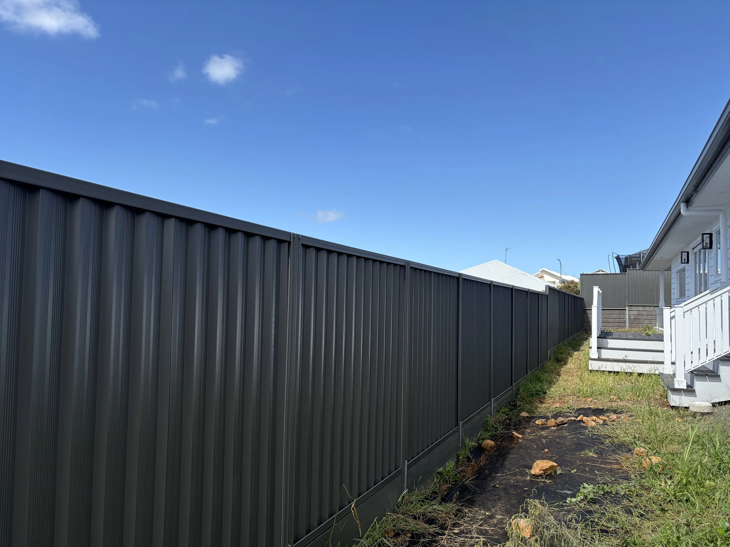 Colorbond fencing with treated pine  sleepers