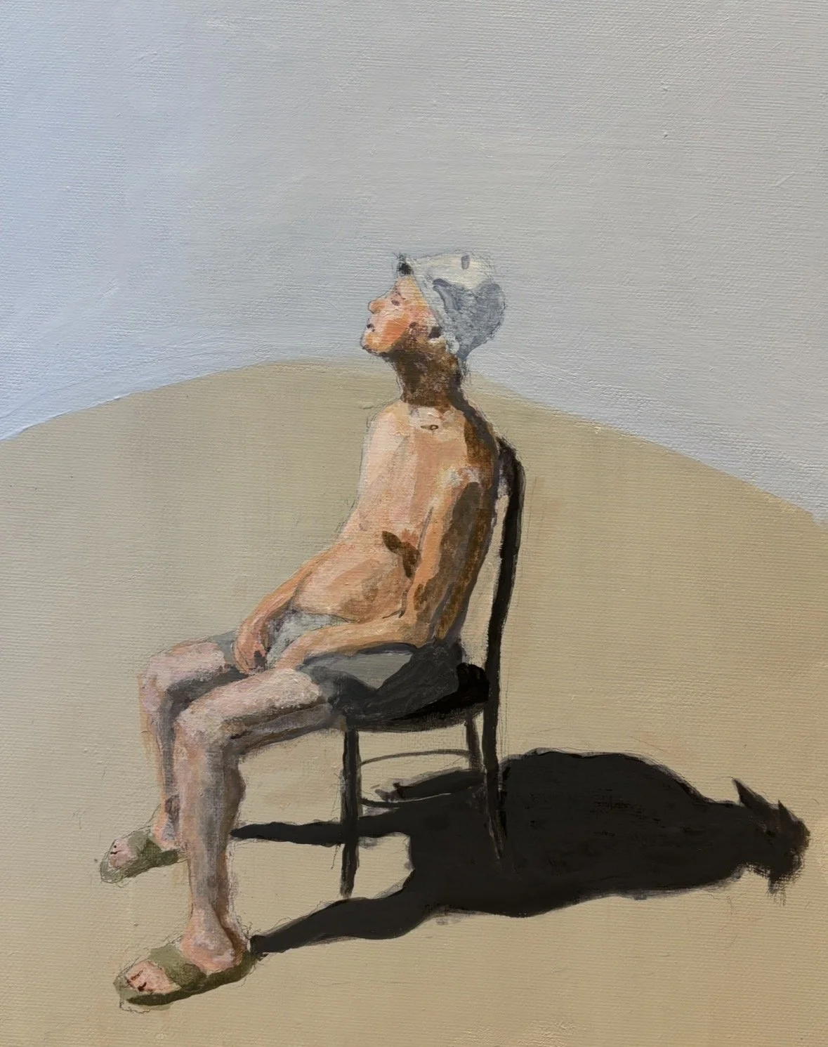 A painting of a nude person sitting on a black chair, looking upward, with a gray hat, against a plain background with a shadow cast on the floor.