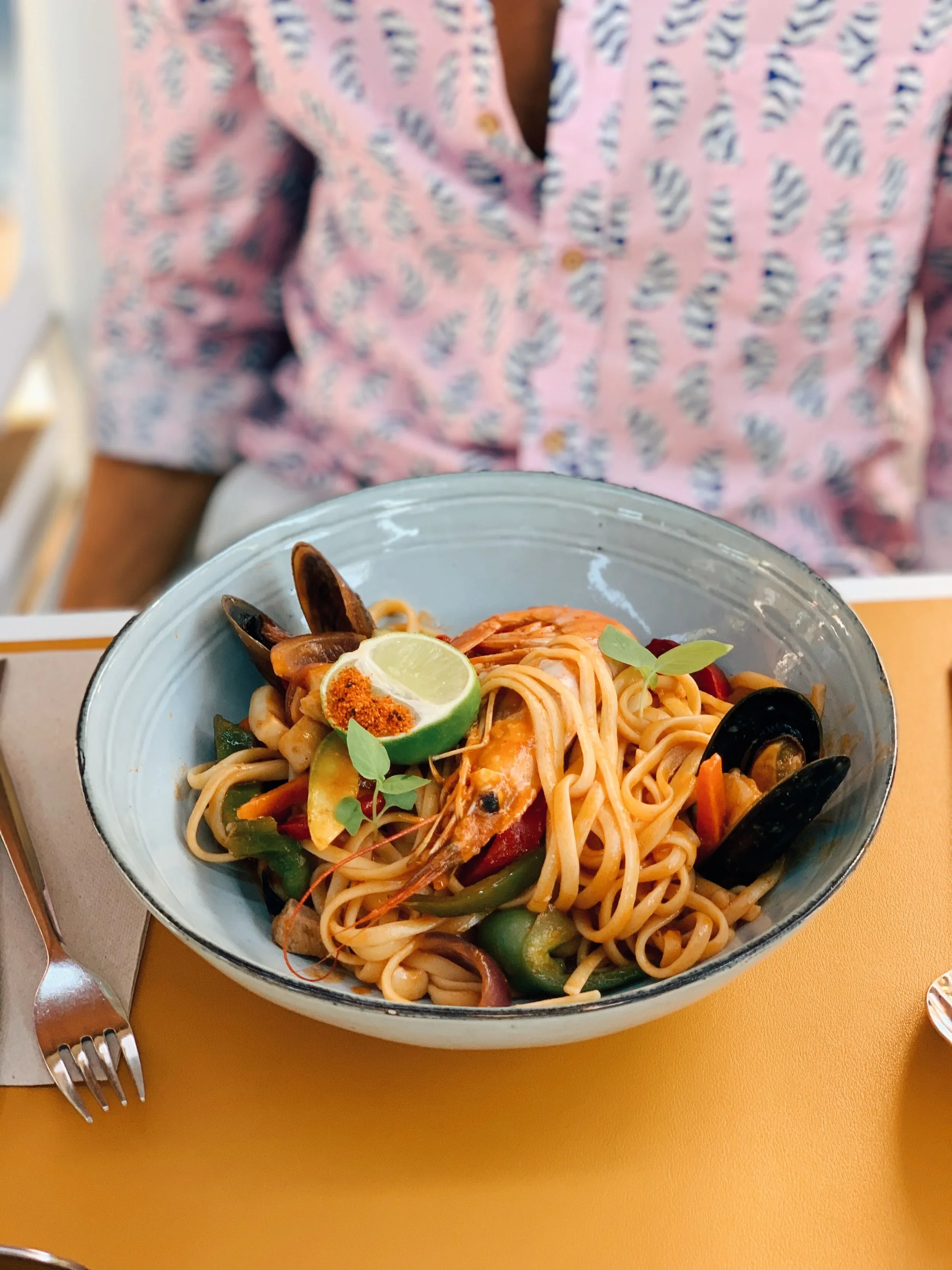 Tapas dish with seafood and pasta served at Mokelino, seaside restaurant in Los Cristianos