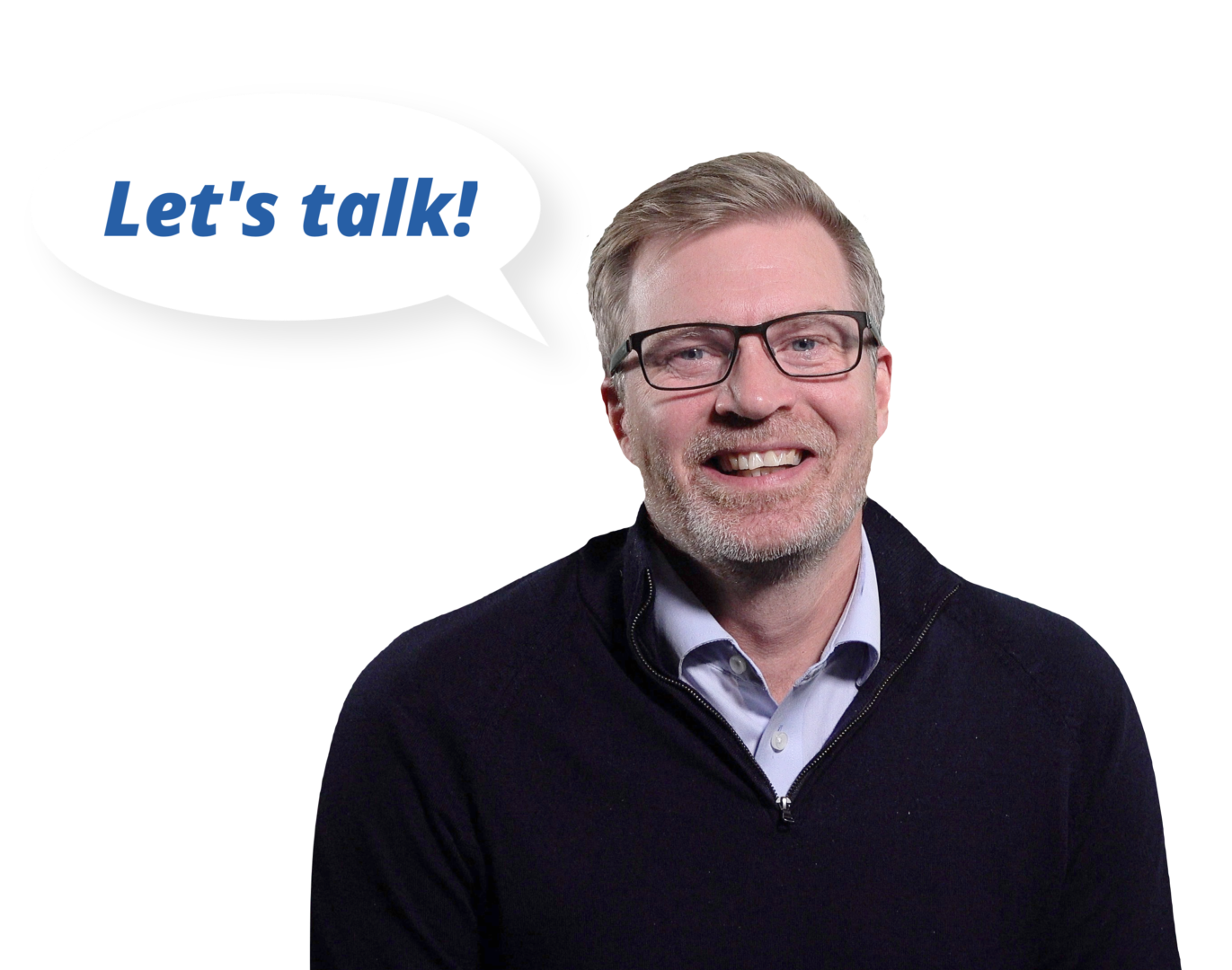 A man with glasses smiling, wearing a dark sweater and a collared shirt, with a speech bubble saying "Let's talk!"