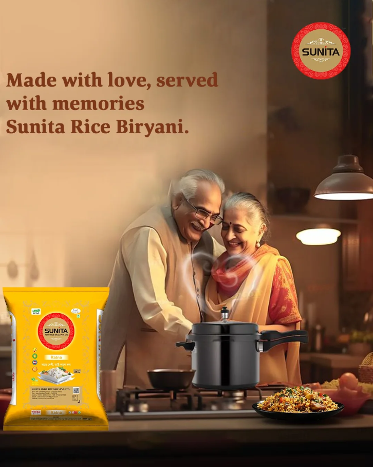 An advertisement for Sunita Rice Biryani showing an elderly Indian couple cooking and smiling in a kitchen, with a bag of Sunita Rice Biryani rice and a plate of cooked biryani on the counter.