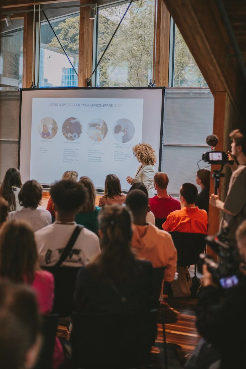 Founder Nabila Doudou presenting educational fashion development program to entrepreneurs and emerging brands at Fous A Fous.