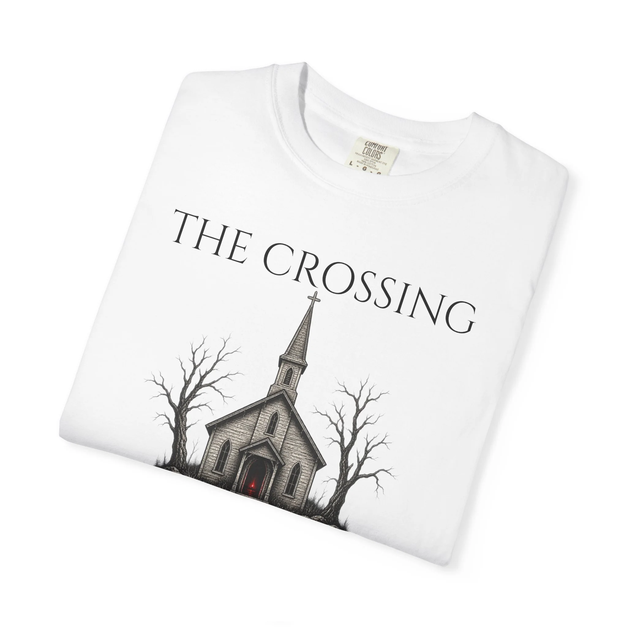 The Crossing graphic tee — White folded artwork closeup