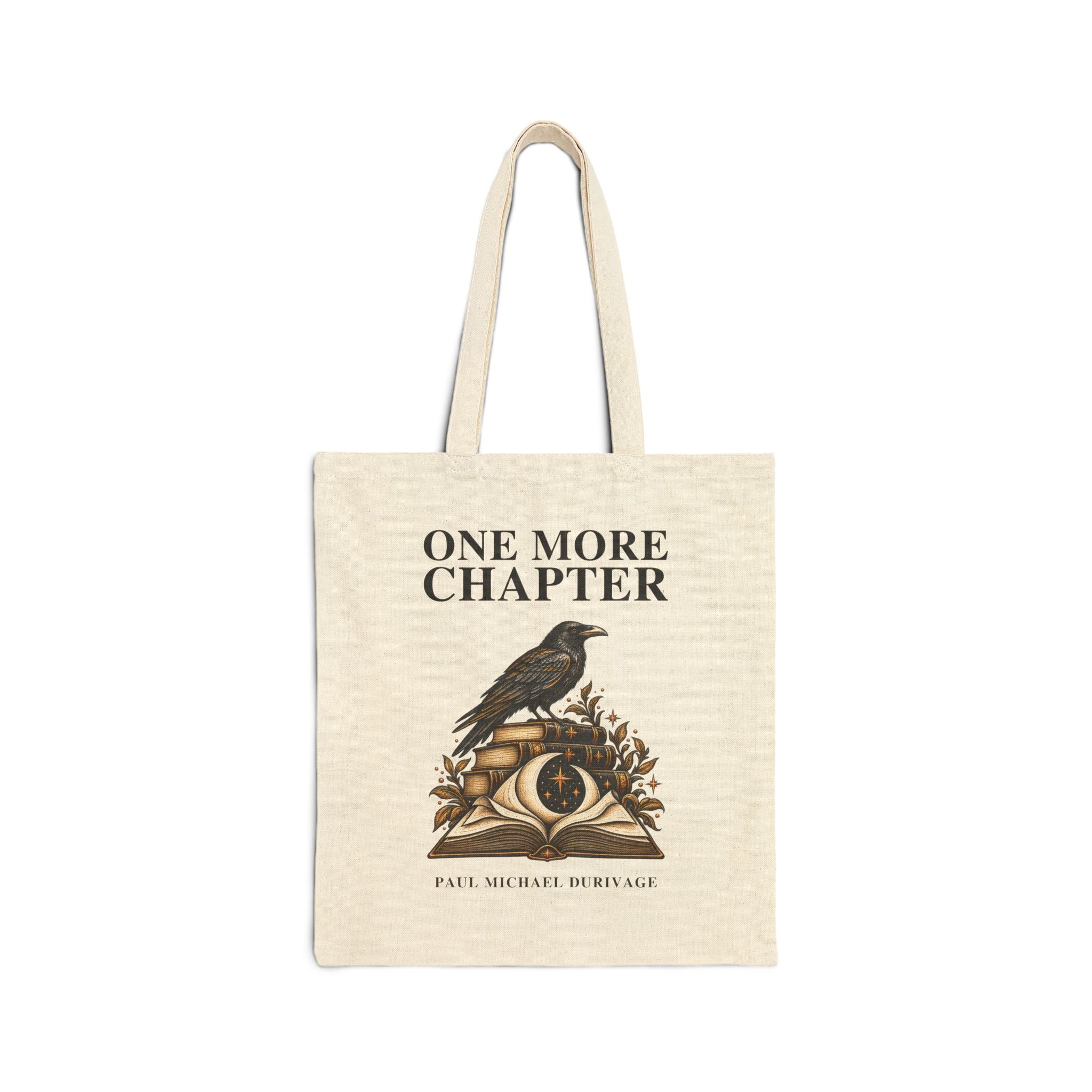 Natural canvas One More Chapter reader tote with a raven, books and moon illustration, large title lettering and Paul Michael Durivage author credit.
