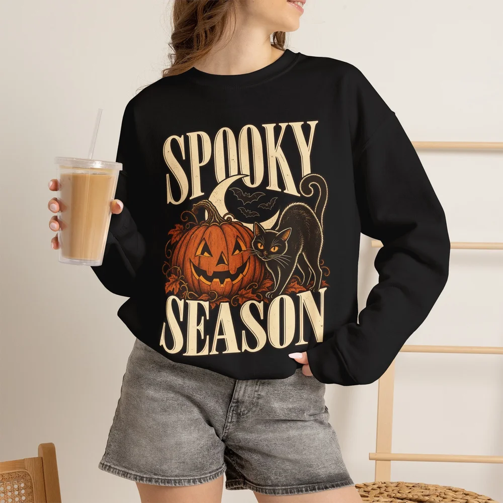 Spooky Season Vintage Halloween Crewneck Sweatshirt — Black Cat & Pumpkin — accurate finished-product mockup