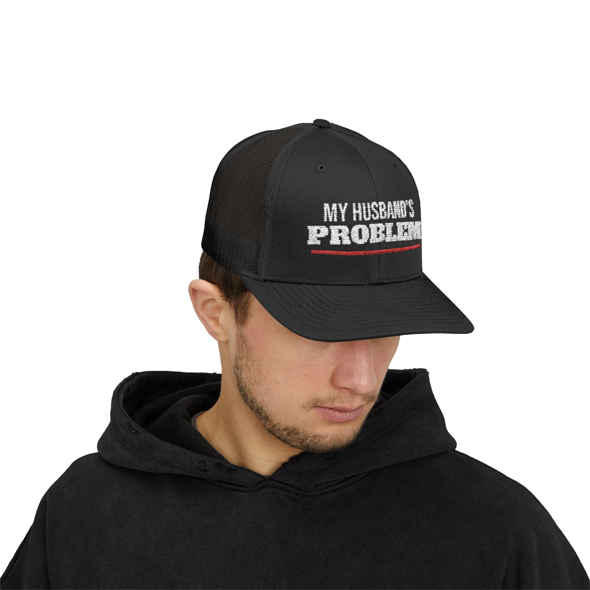 Person wearing the Black My Husband’s Problem trucker hat, front view.