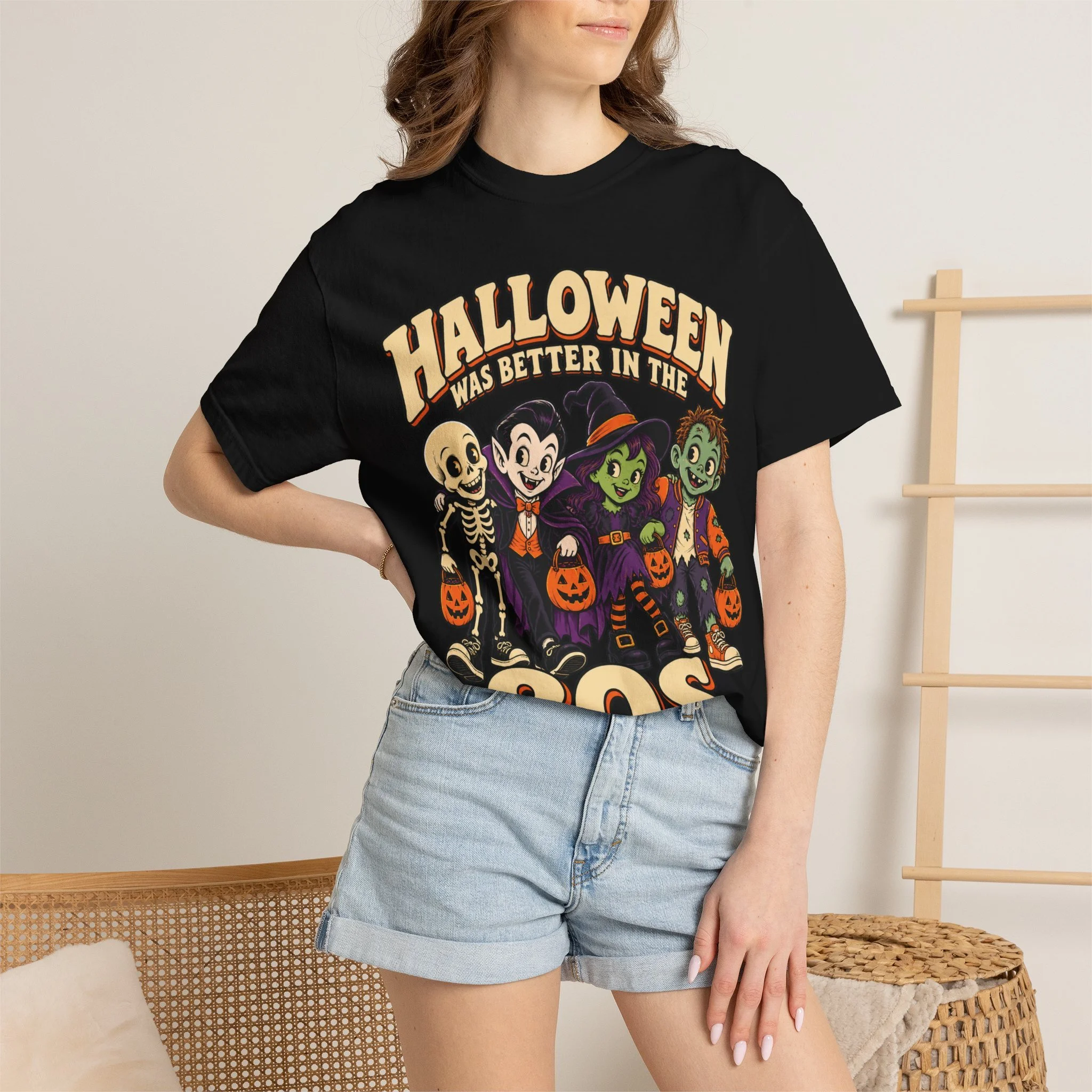 Model wearing Black retro Halloween tee, full front artwork