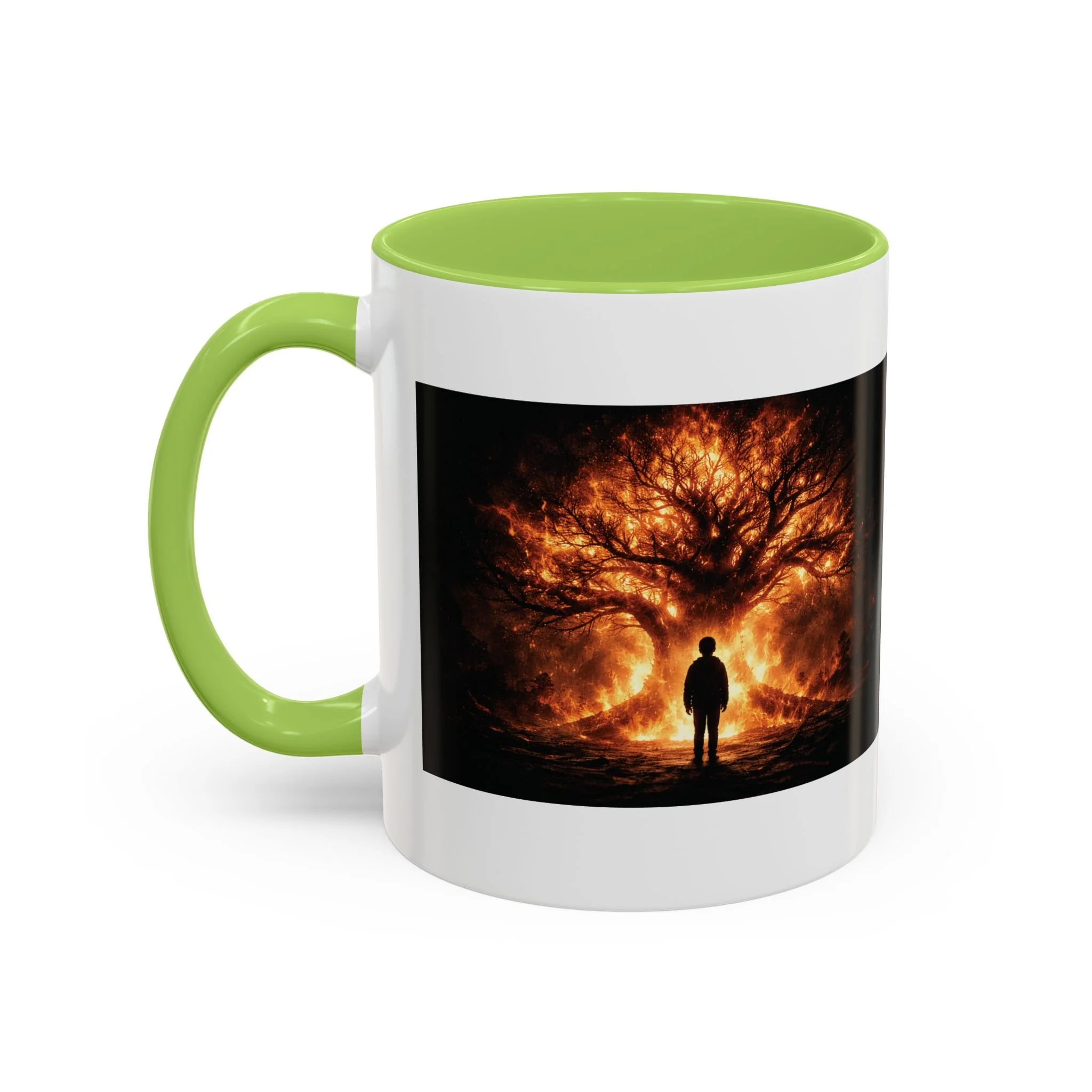 Pandora’s Child 11oz ceramic coffee mug with light green interior and handle, showing the full fiery tree and silhouetted figure artwork on one side.