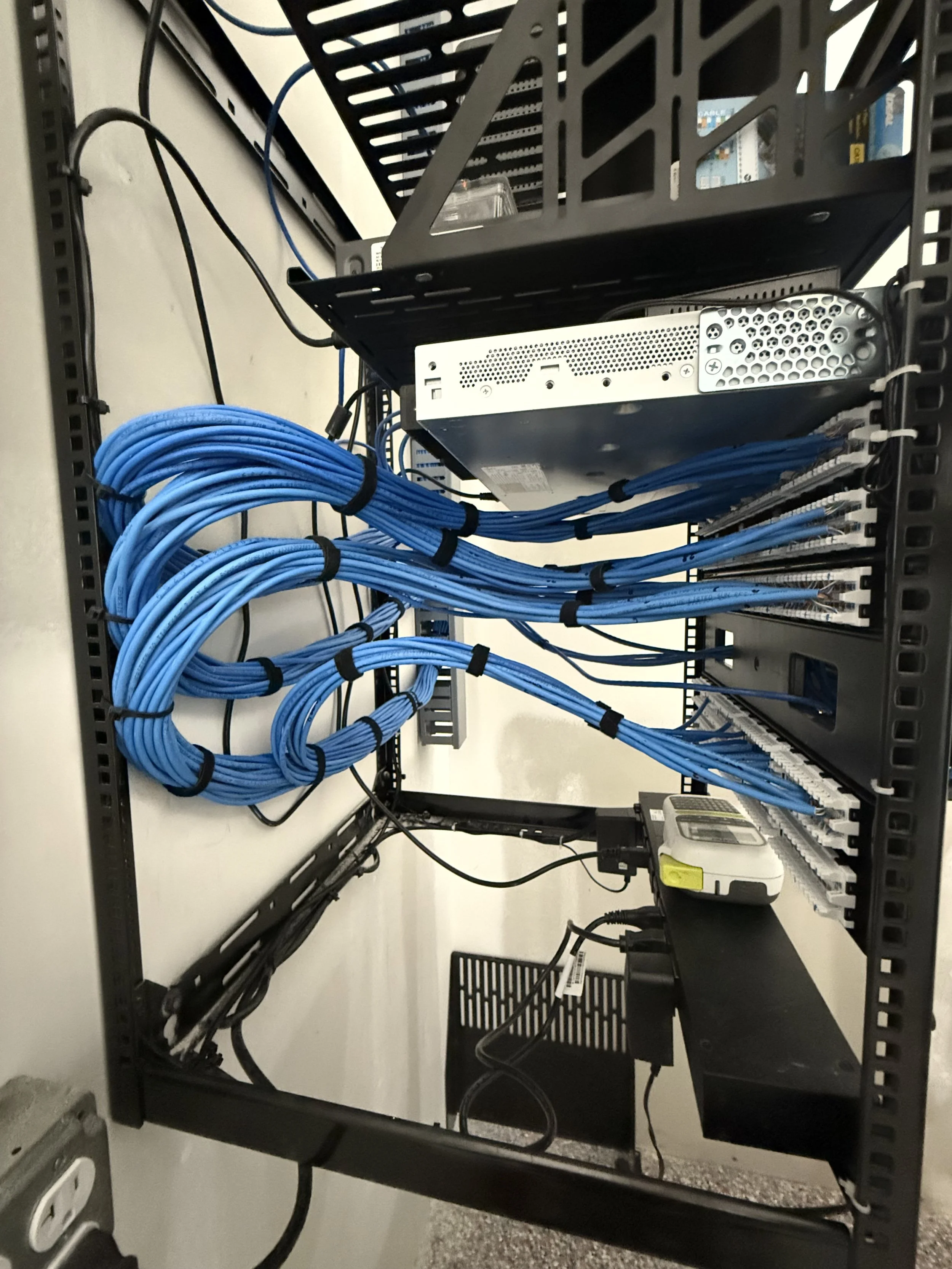 Cat 6 network data rack with structured cabling and professional installation for reliable commercial networking