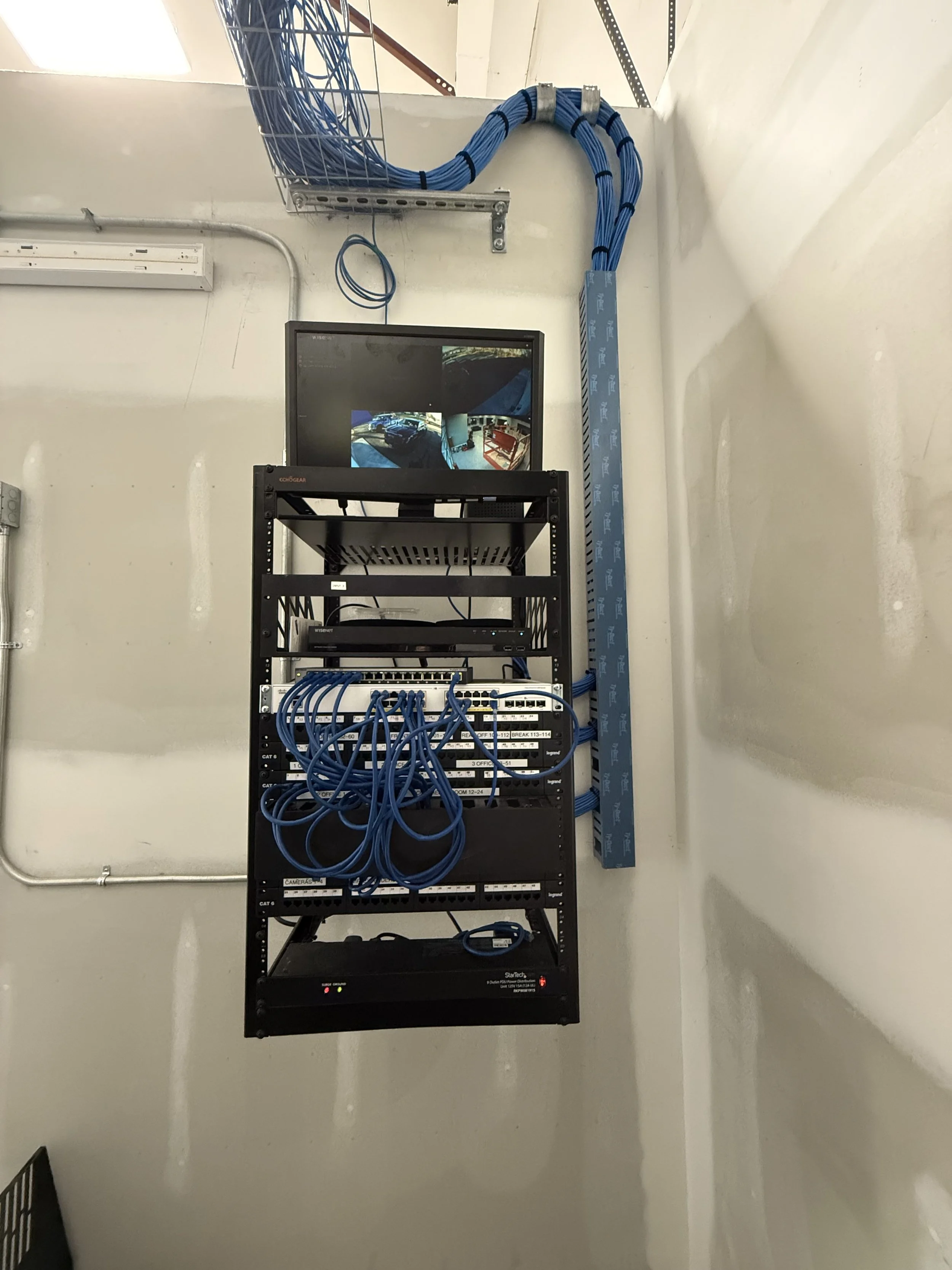 Cat 6 network data rack with structured cabling and professional installation for reliable commercial networking