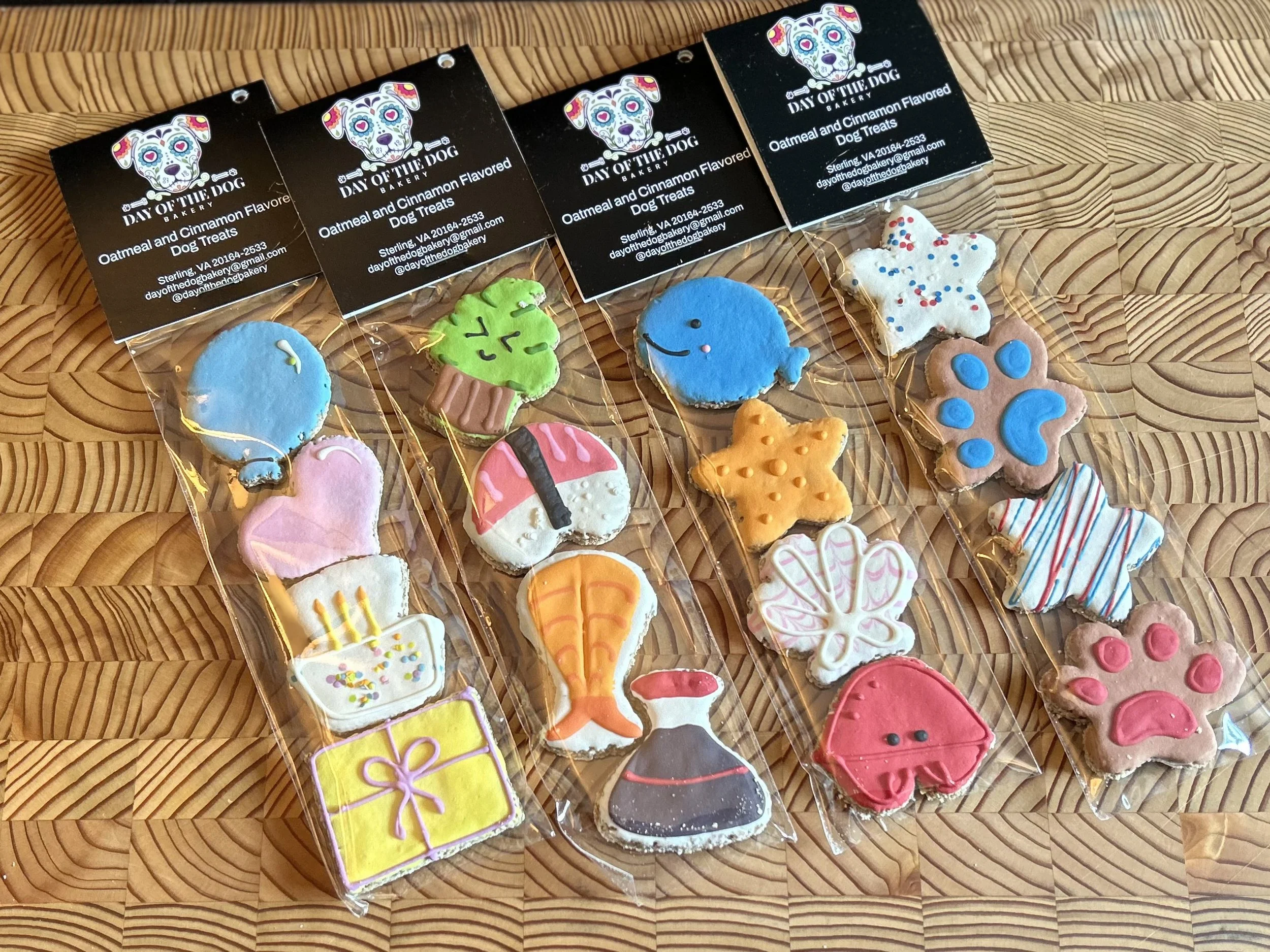 Assorted Day of the Dog Bakery  cookies in retail packaging