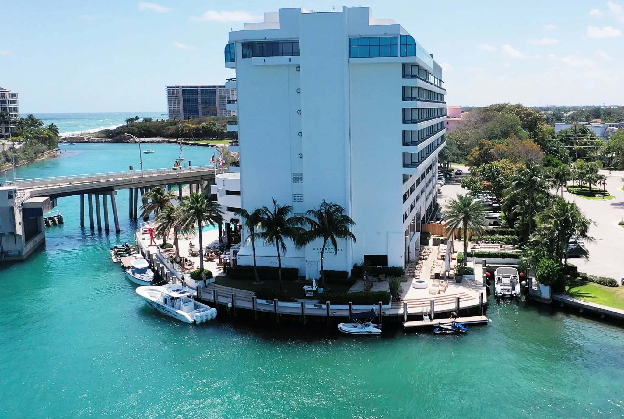 Waterfront yacht hampton Sales Office at the Waterstone Resort & Marina building in the intracostal "Lake Boca", Boca Raton. Yachthamptonsales.com