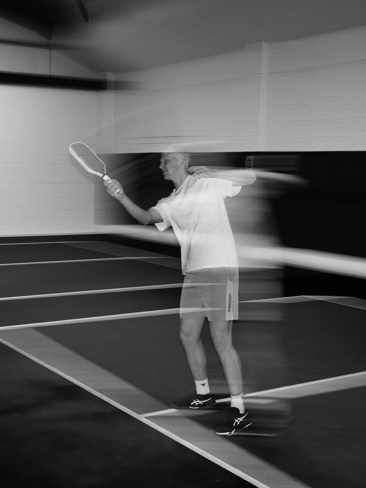 peak-pickleball-sheffield-black-and-white-thirdshot-flash-motion.jpg