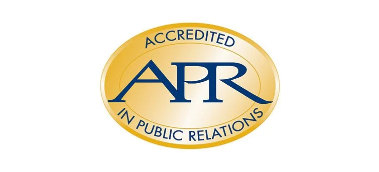 Gold oval badge with blue text reading "APP Accredited in Public Relations"