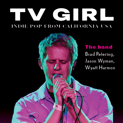 Cover of a magazine titled 'V Girl: Indie Pop from California, USA,' featuring a close-up of a young man with closed eyes, holding a microphone, and singing, with colorful lighting effects.