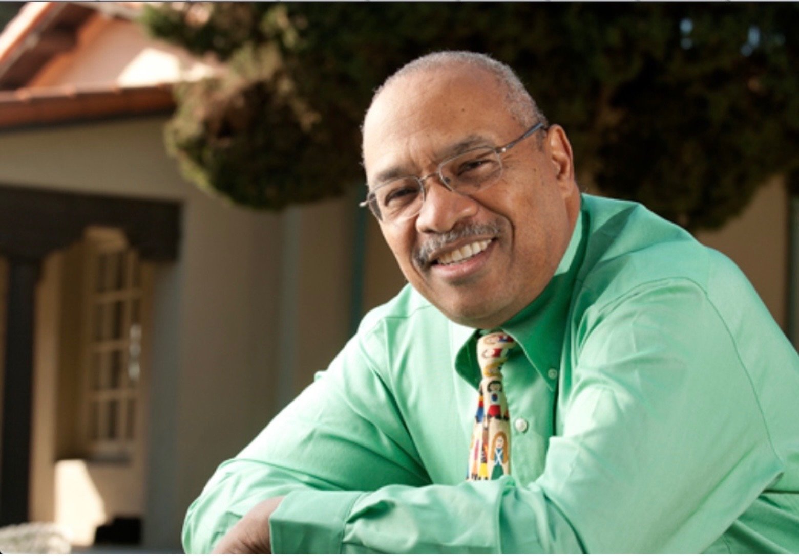 Silhouette of a person with short hair against a light background.