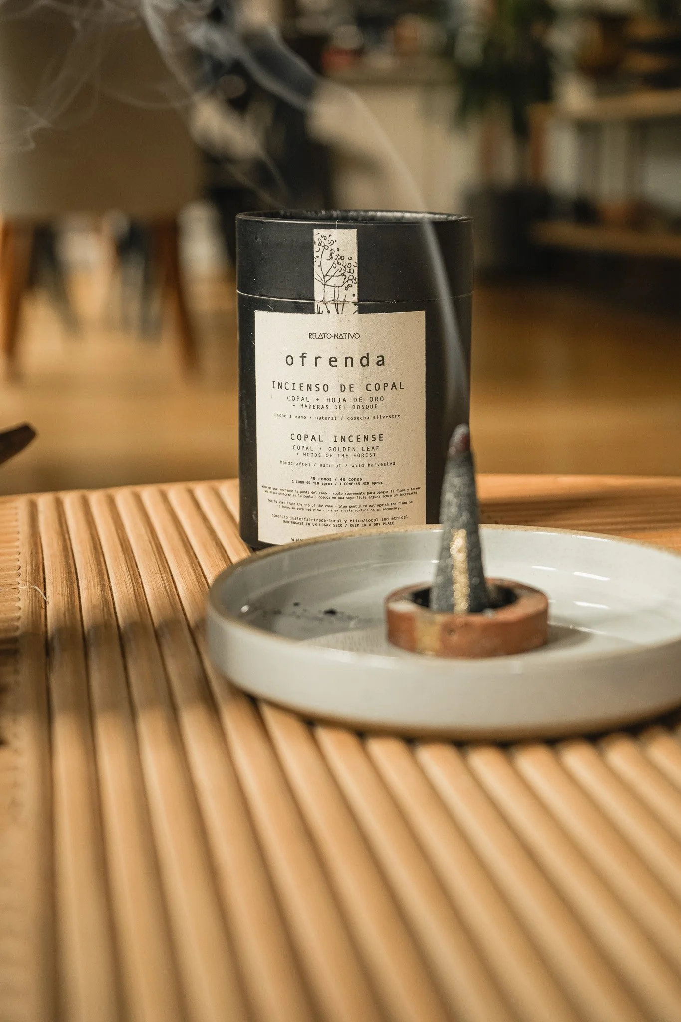 Curated Style Collective interior styling detail with copal incense, ceramic tray and natural wood textures creating a warm, ritual-focused home atmosphere.