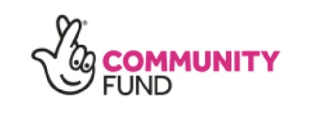 Logo for Community Fund featuring a hand with crossed fingers and pink and black text.