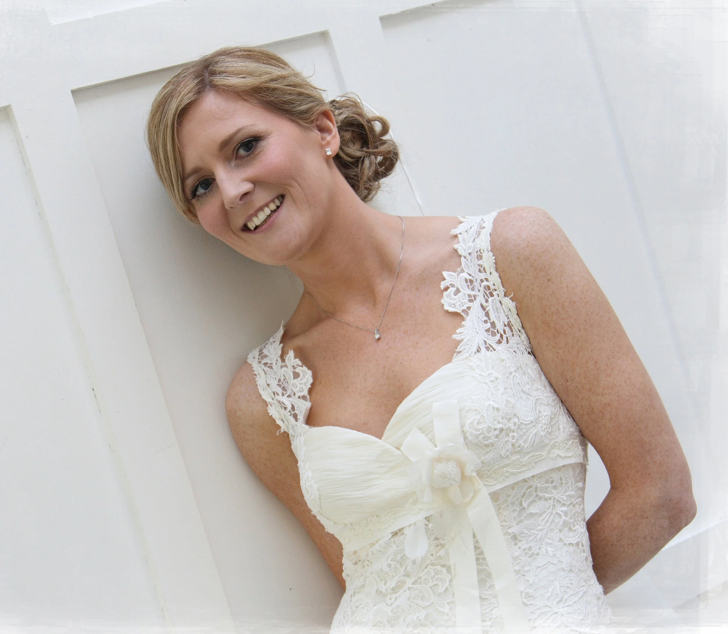A smiling bride on her wedding day.