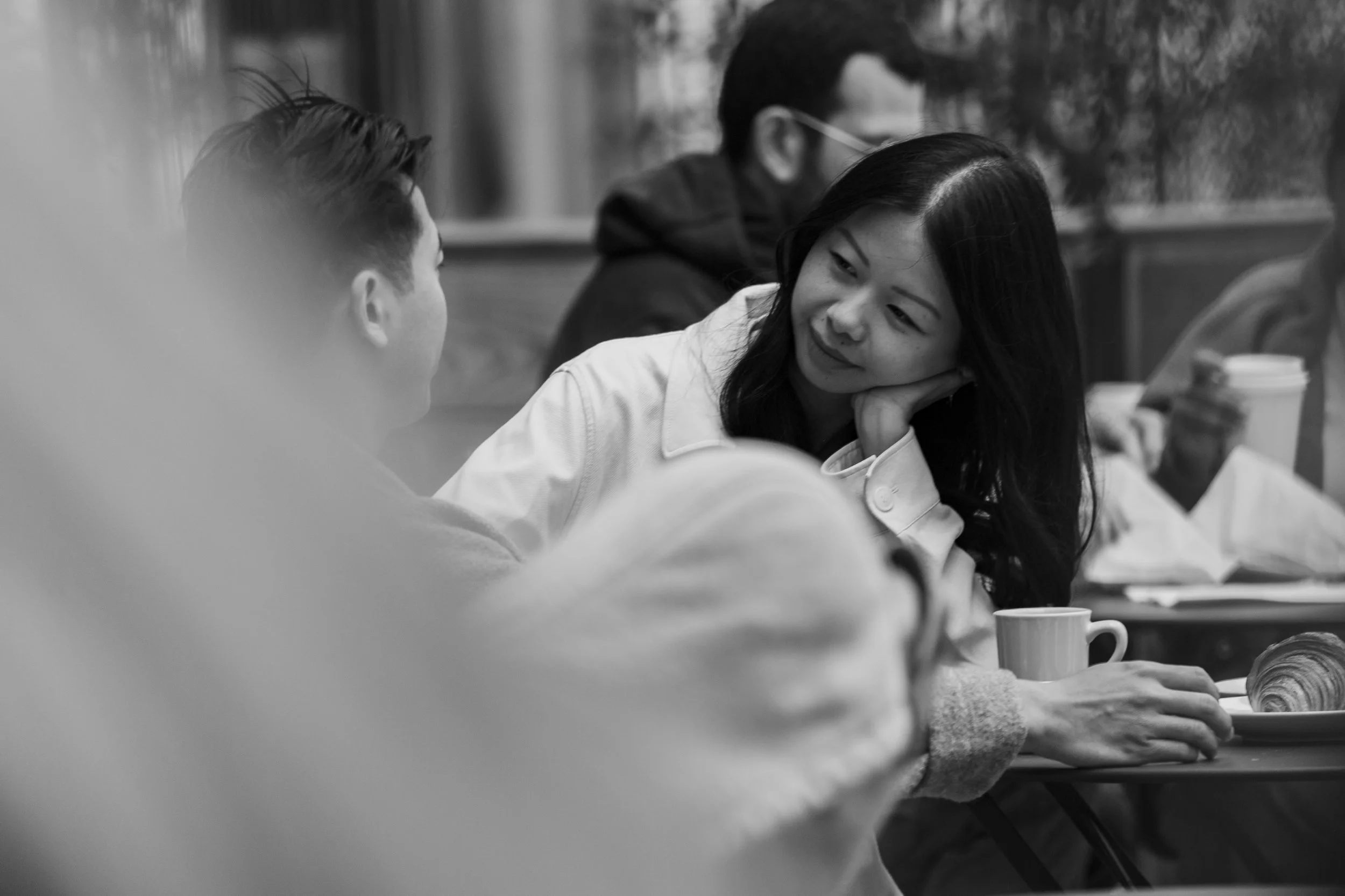 Bride looking longingly at the groom during their engagement session.