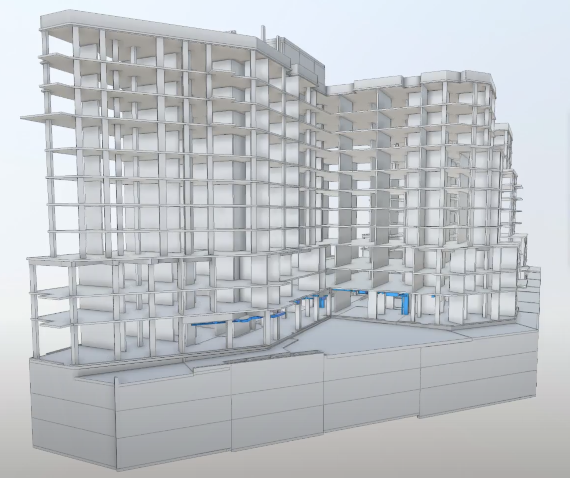 Architectural rendering of a multi-story building with a detailed structural framework and an underground parking garage.