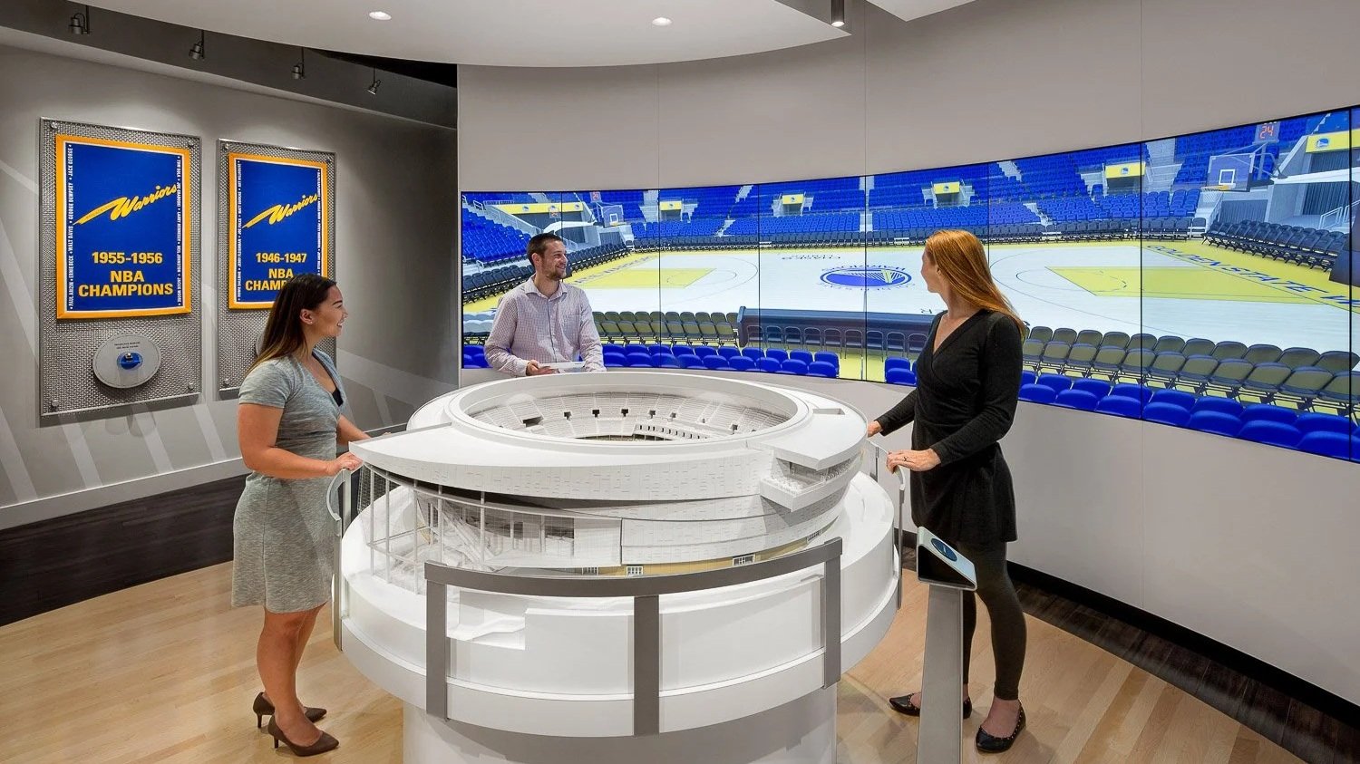 Inception: A scale model of the arena sits on a rotating "lazy-suzan" base with synchronized digital content on the screen array backdrop