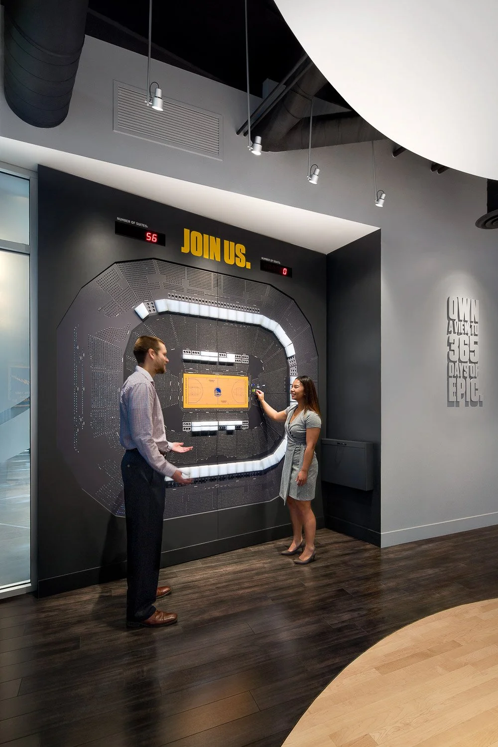 Lite Brite map: Once visitor purchase a seat or suite, they insert their acrylic peg into the giant seat map wall to commemorate the occasion