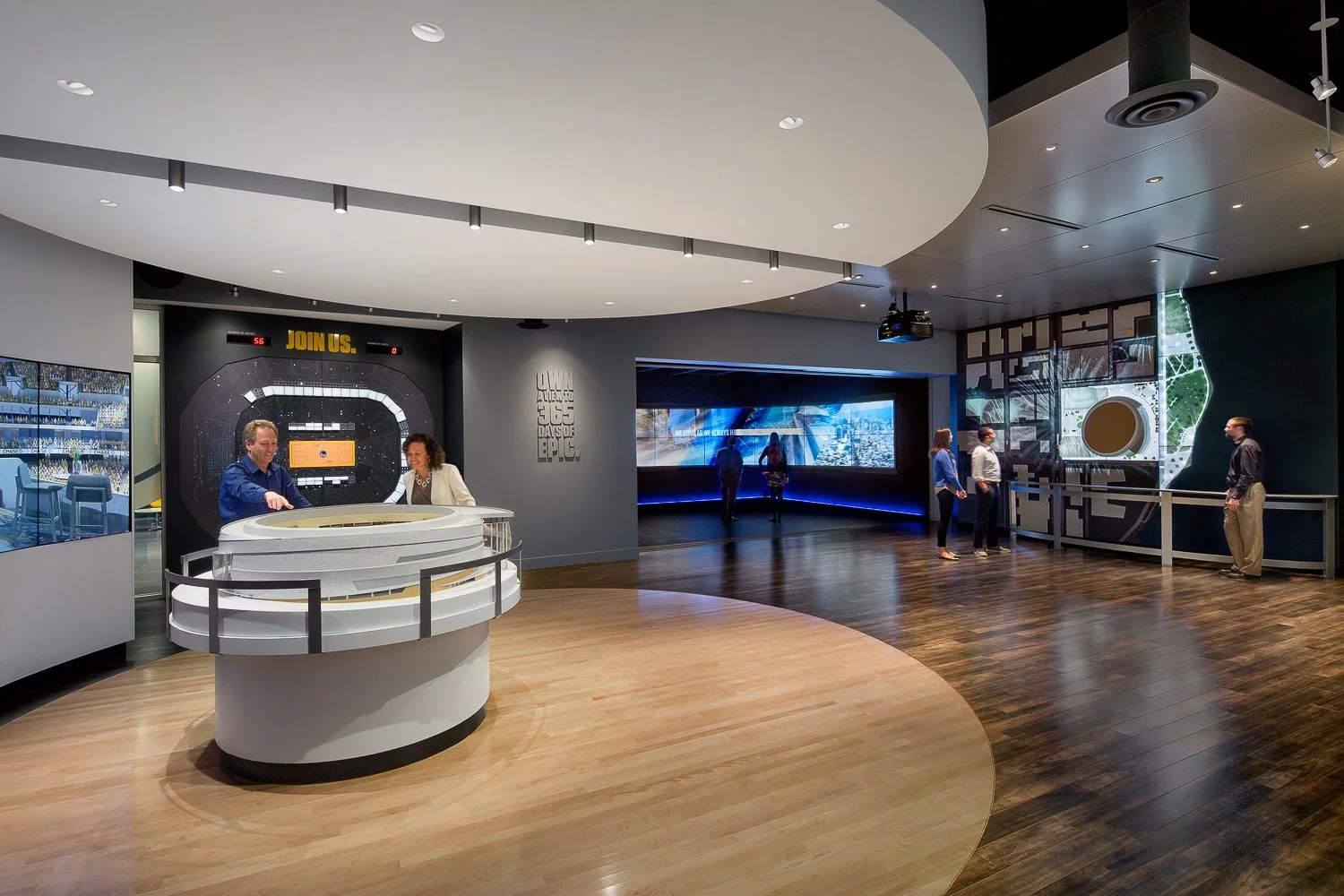 Upon video ending, a custom designed acoustic wall partially opens to allow guests to pass-thru