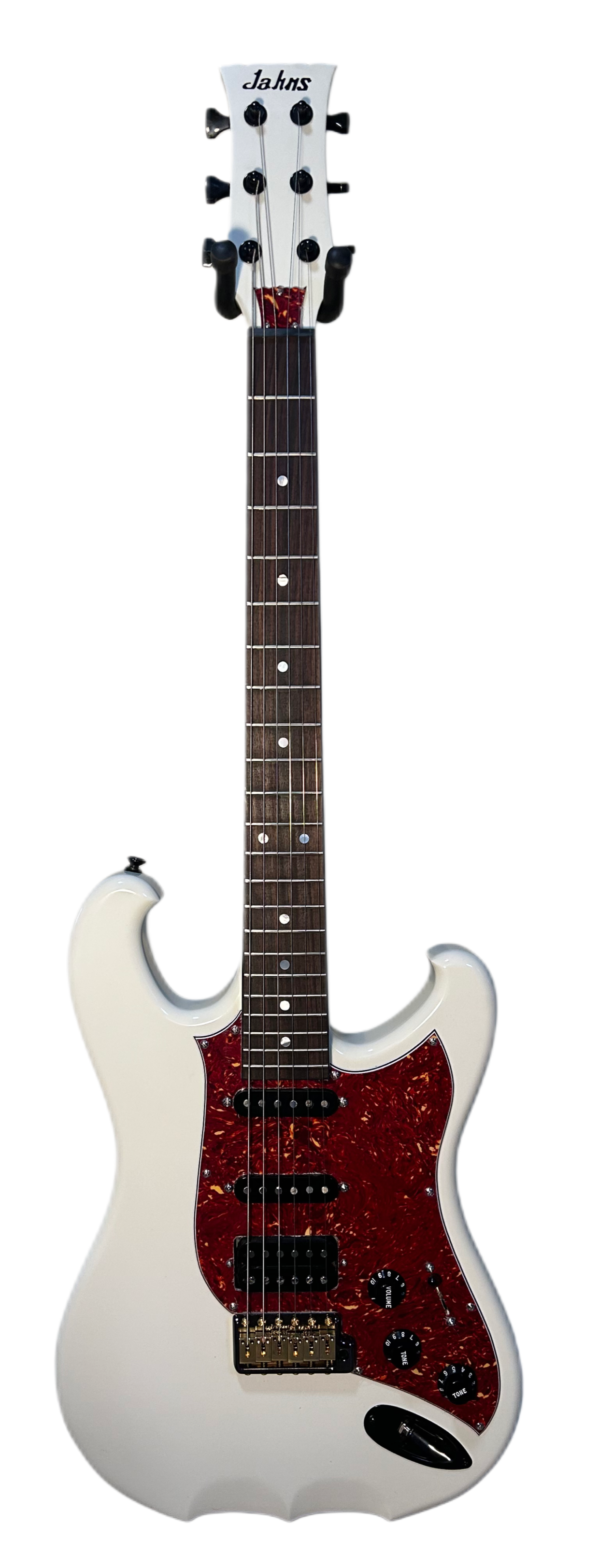 • Olympic White finish
• Honduran mahogany body
• Honduran mahogany neck
• Rosewood fingerboard with genuine mother-of-pearl inlays
• 12” radius
• Black binding
• H/S/S pickup configuration
• Push-push coil split on humbucker
• Black & gold MannMade 