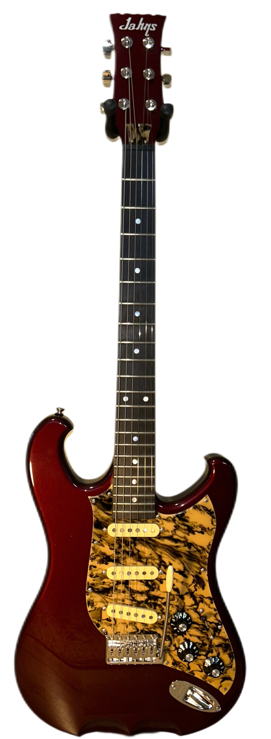     •    Honduran mahogany body
    •    Honduran mahogany neck
    •    Ebony fretboard with genuine mother-of-pearl dot inlays
    •    9.5” radius
    •    25.5” scale length
    •    Hand-wound single-coil pickups
    •    MannMade nickel bridge
