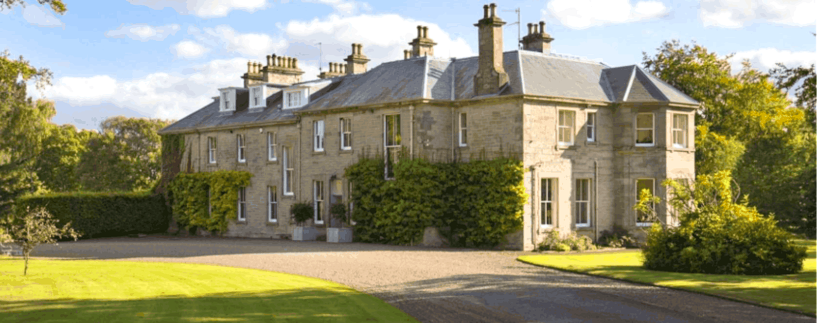 Historic estate home with large driveway in Scottish Borders