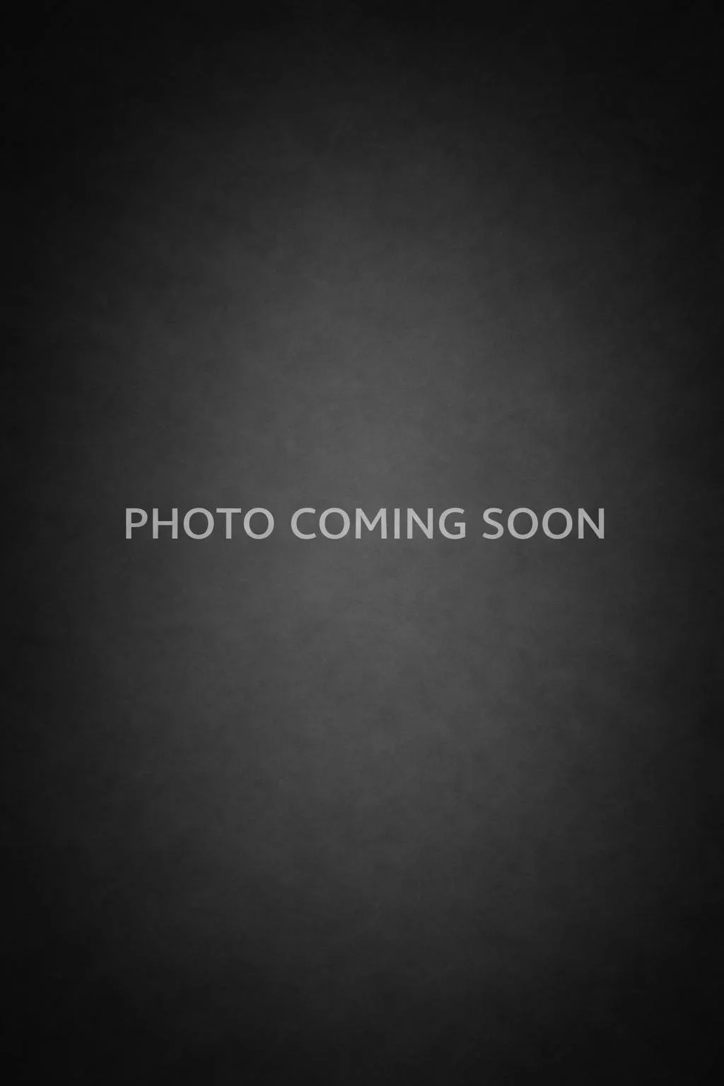 Black background with the text 'PHOTO COMING SOON' in the center.
