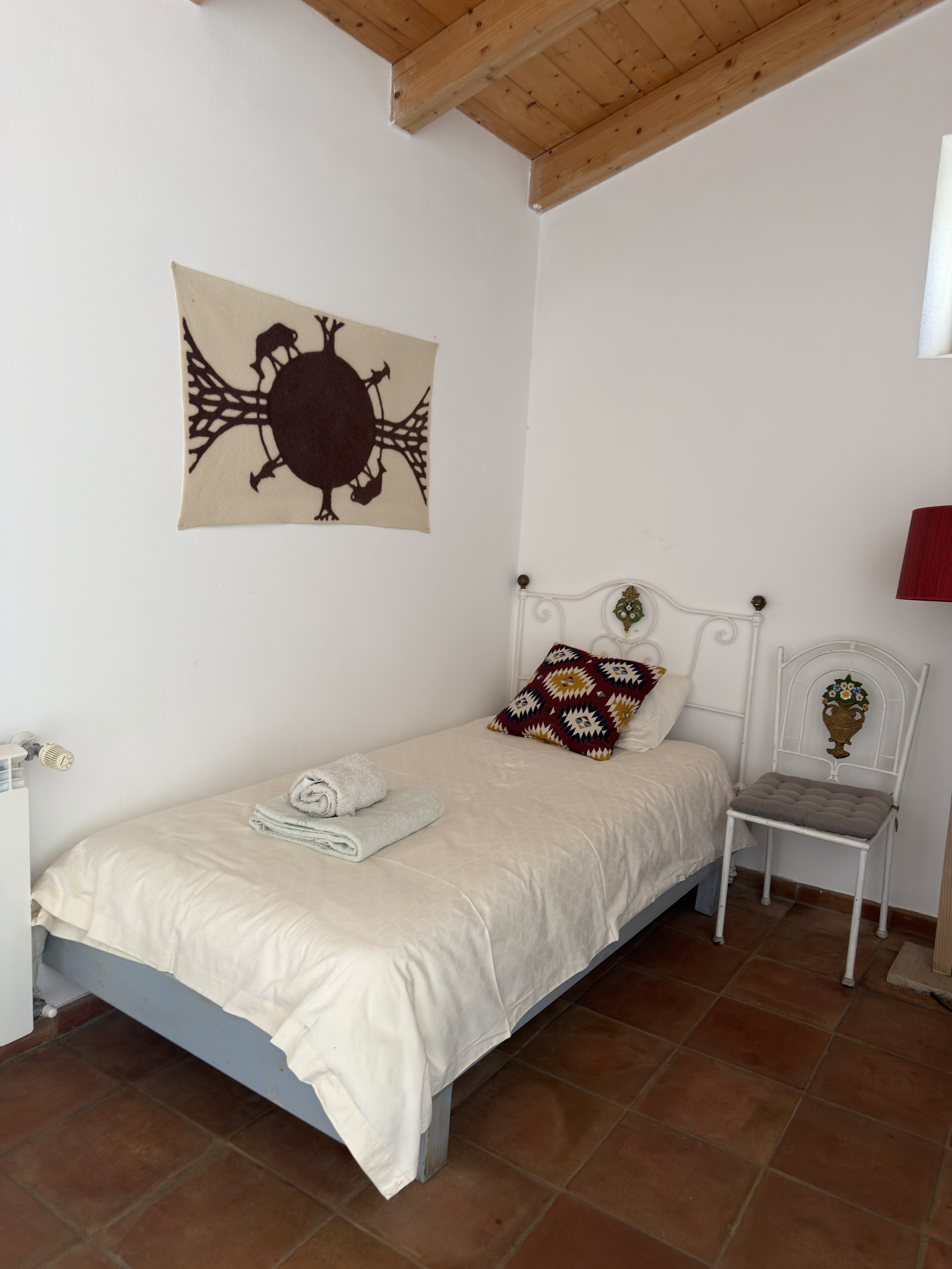 Zen-inspired wellness retreat in Algarve, recognized as one of the best yoga retreats in the Algarve, offering yoga with Debbie, pranayama, massages with Liladhar, mindful living in silence and nature, and a digital detox experience.