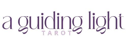 Logo with purple and white text reading "a guiding light TAROT" on a black background.