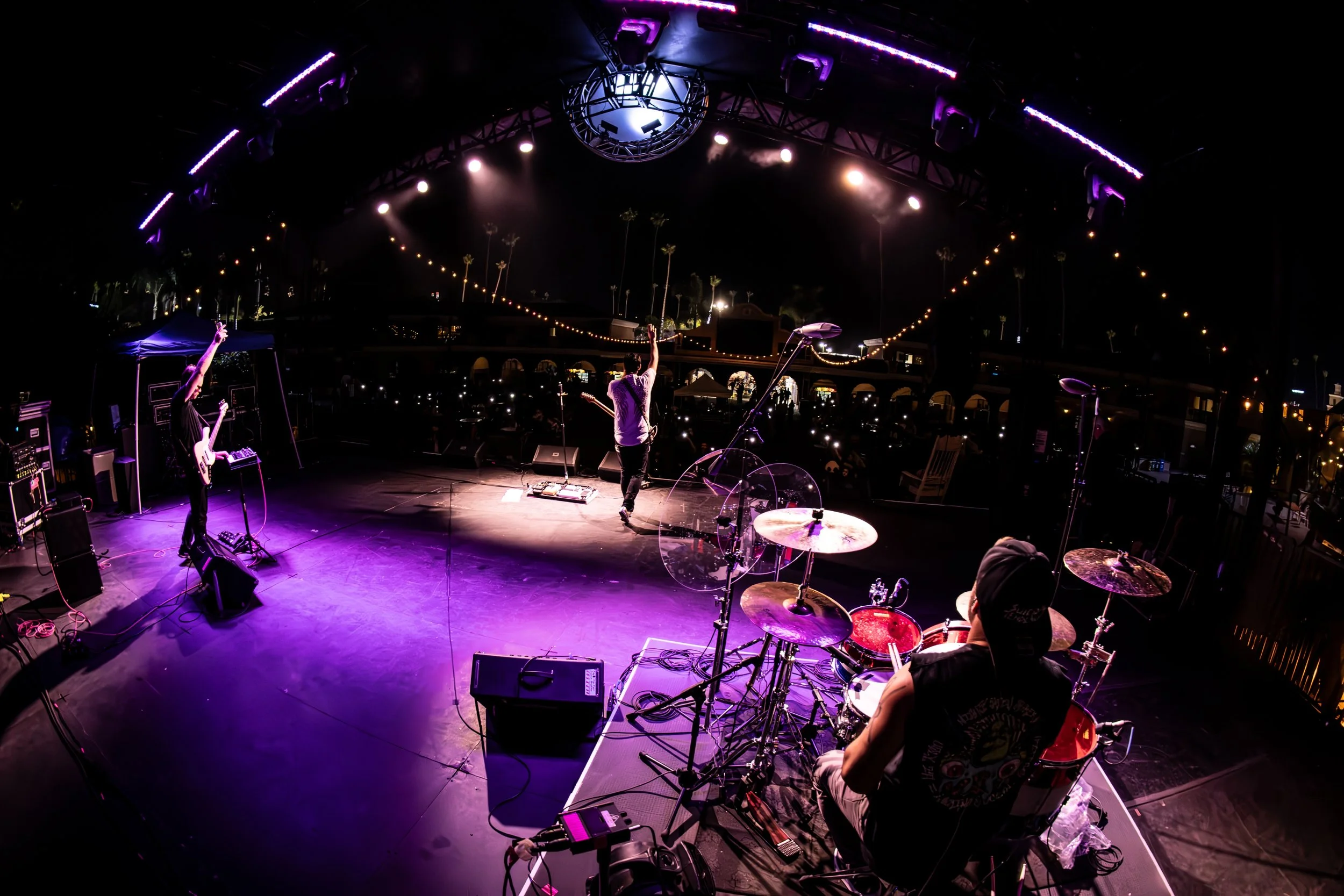 Cory Noonan drumming live back stage wide view at The Del Mar Fair in San Diego, California with Matthew Phillips. Photo credit Elfego Becerra.
