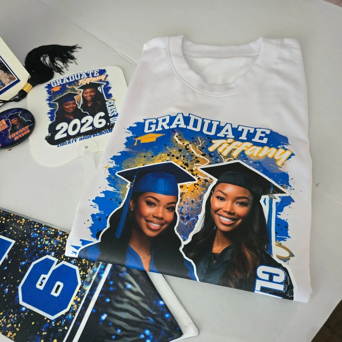 Graduation is coming FAST 🎓💙
Don&rsquo;t show up with a basic shirt when you can have something THIS personal ✨

✔️ Custom photos
✔️ School colors
✔️ Designed just for your graduate

Spots are limited and turnaround time matters ⏳

Message us to ge