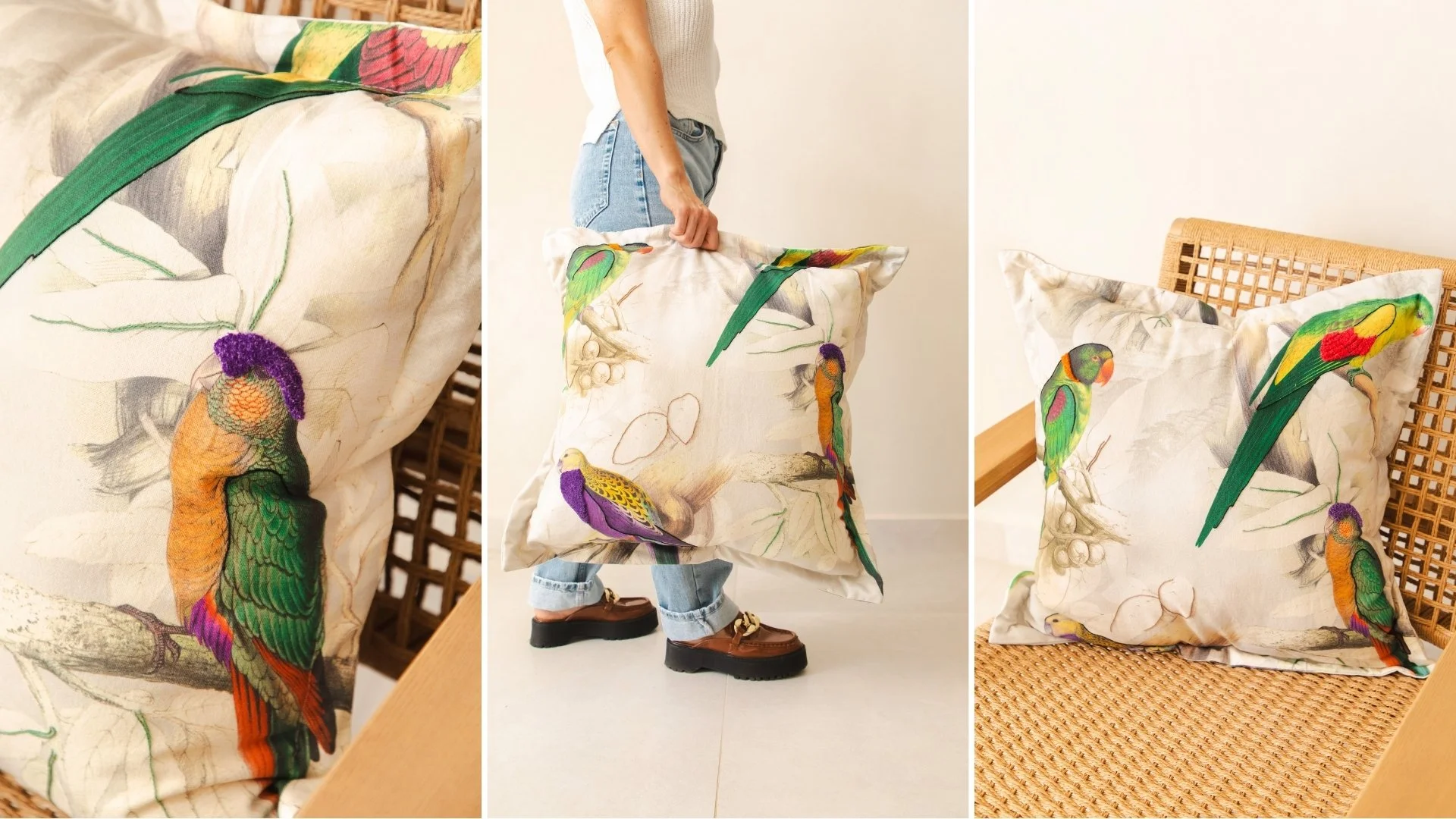 Three images of a decorative pillow with a bird pattern. The first image is a close-up of the pillow's embroidery showing colorful bird designs. The second image shows a person holding the pillow, standing in a room with white walls and light flooring. The third image displays the pillow placed on a woven rattan chair with a wooden frame.