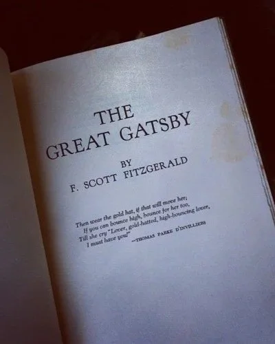 Open book displaying the title page of 'The Great Gatsby' by F. Scott Fitzgerald.