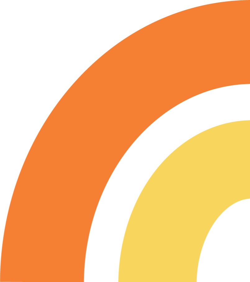 Close-up of a colorful target with yellow, black, and orange rings.