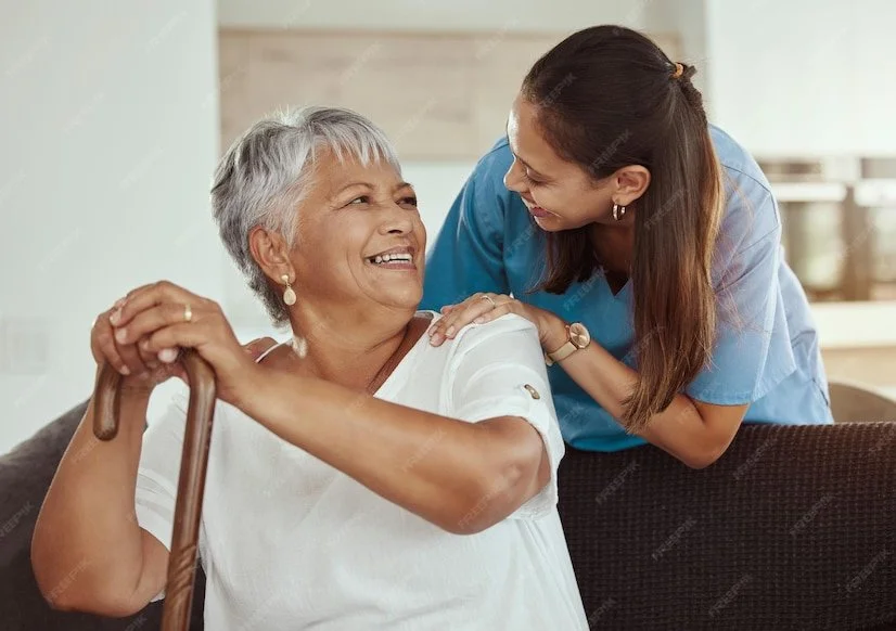 happy-relax-senior-woman-with-caregiver-smile-while-sitting-living-room-sofa-nursing-home-support-help-professional-nurse-healthcare-worker-helping-elderly-lady-patient_590464-8458.jpg