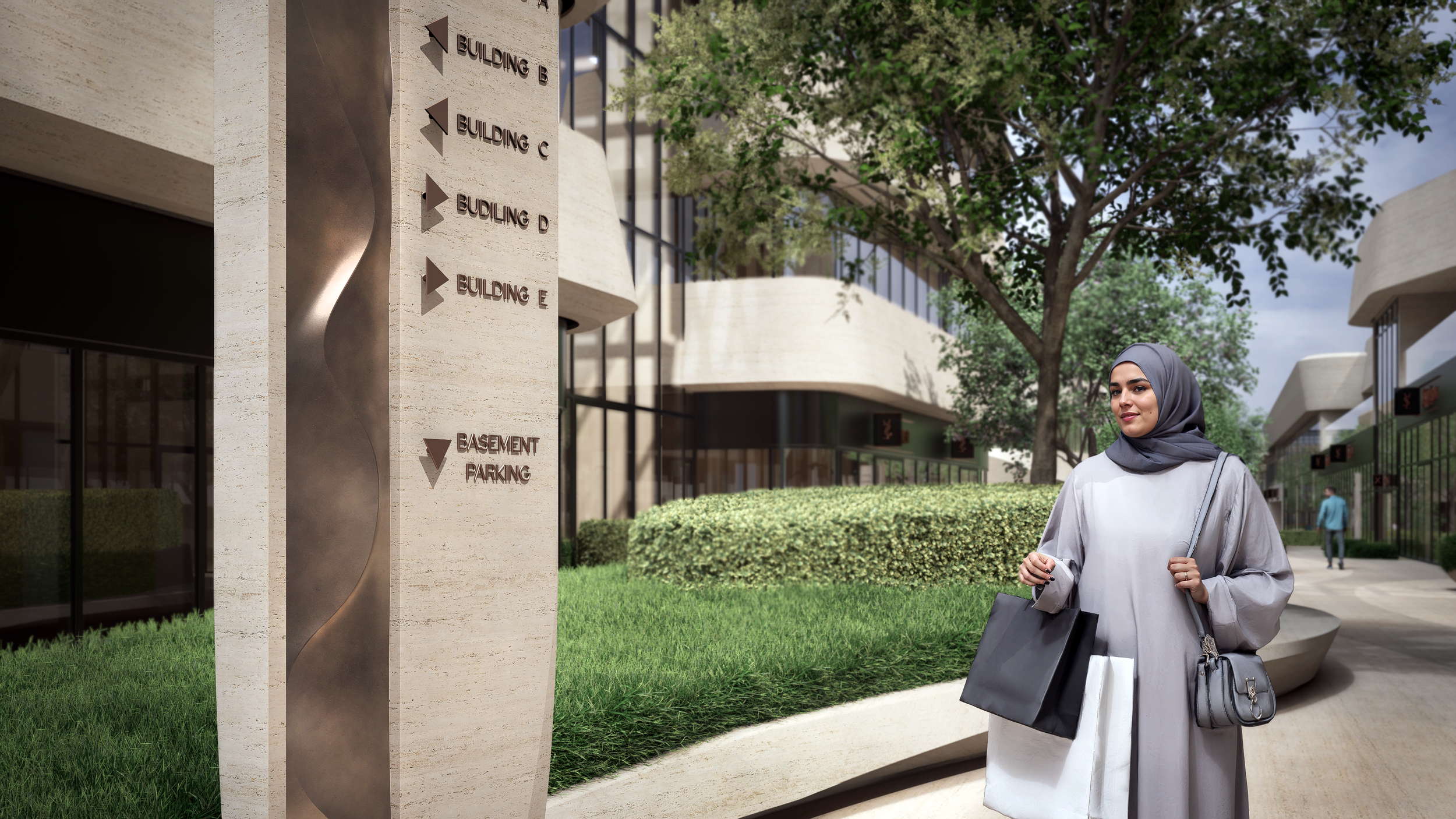 A woman wearing a grey hijab and light grey dress carrying shopping bags walks past a modern building complex with labeled signs indicating building directions and parking. Green trees and bushes are visible around the area.