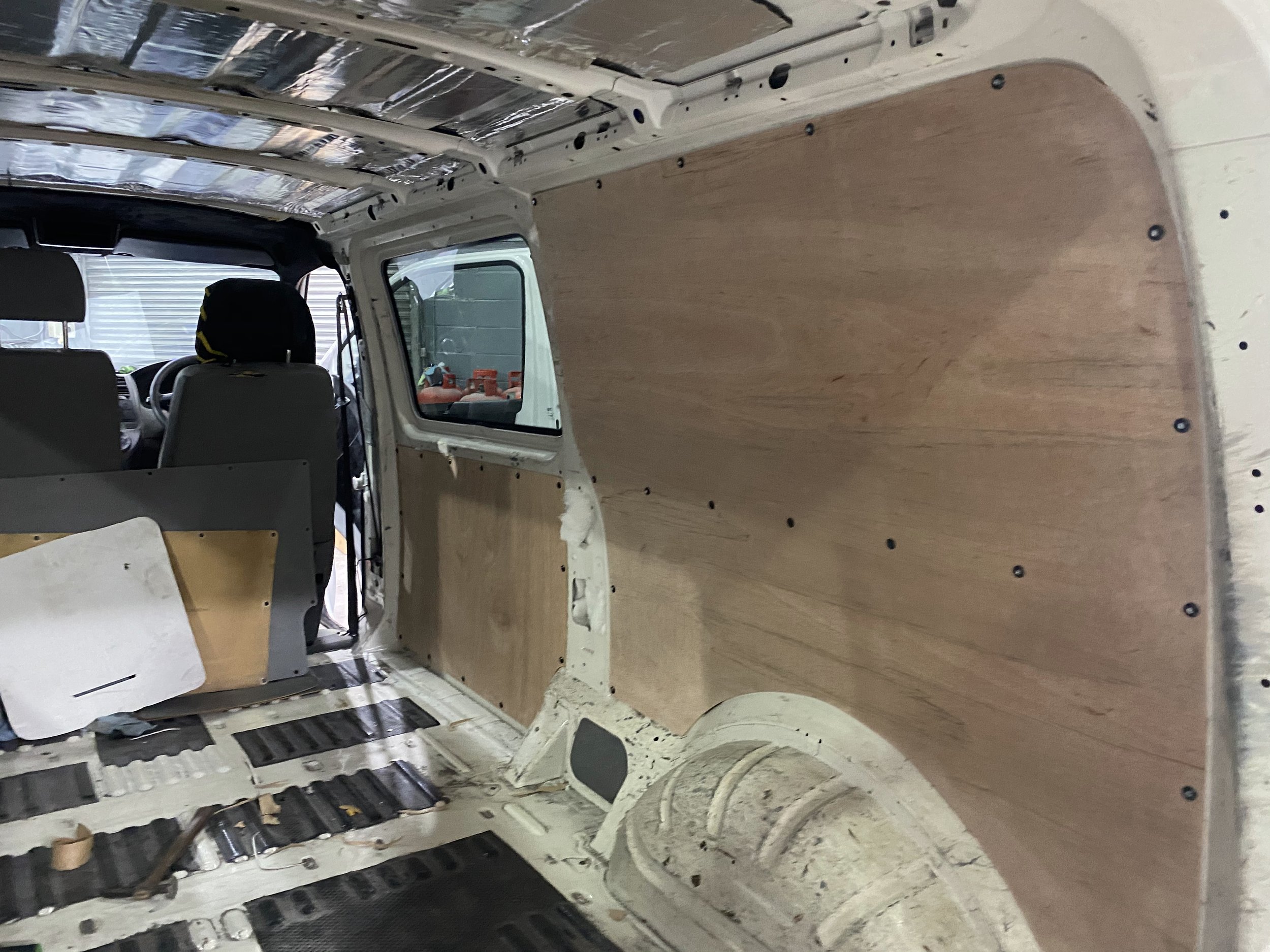 Ply lining panels fitted inside the van