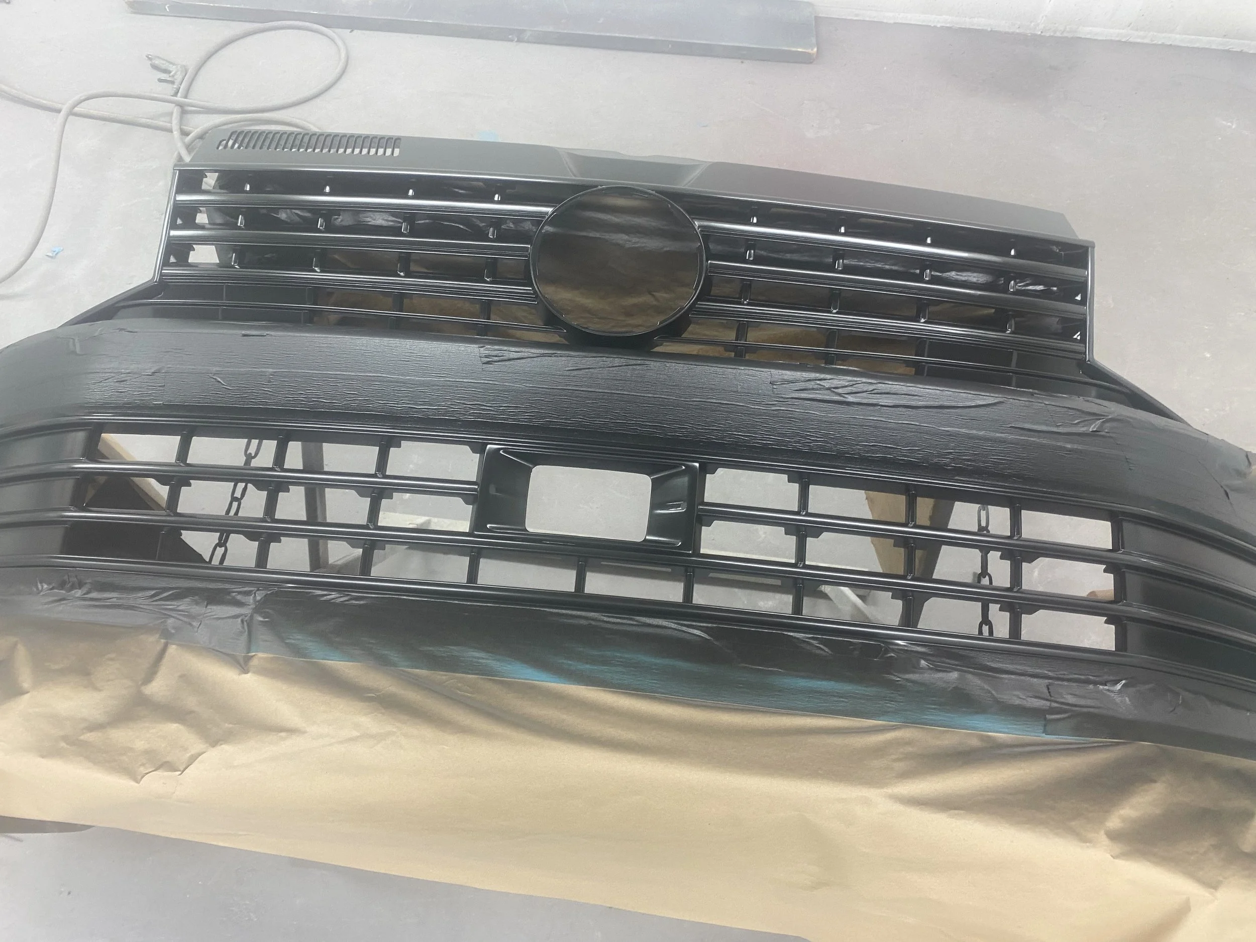 Commercial front bumper colour coded with gloss black grills