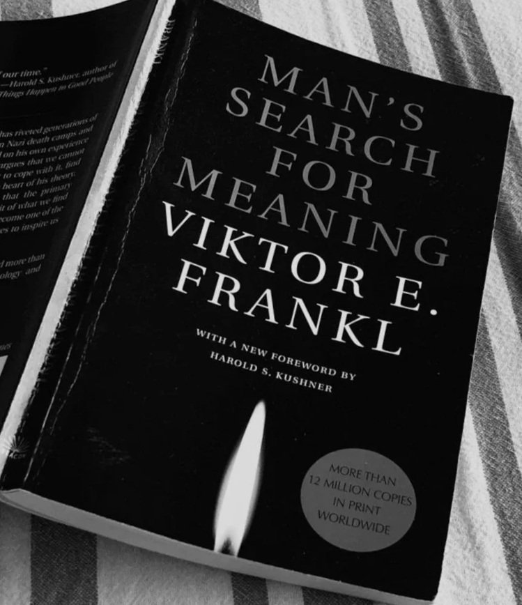 Cover of the book 'Man's Search for Meaning' by Viktor E. Frankl, with a new foreword by Harold S. Kushner, featuring a candle flame illustration and a circular sticker stating 'More than 12 million copies in print worldwide'.