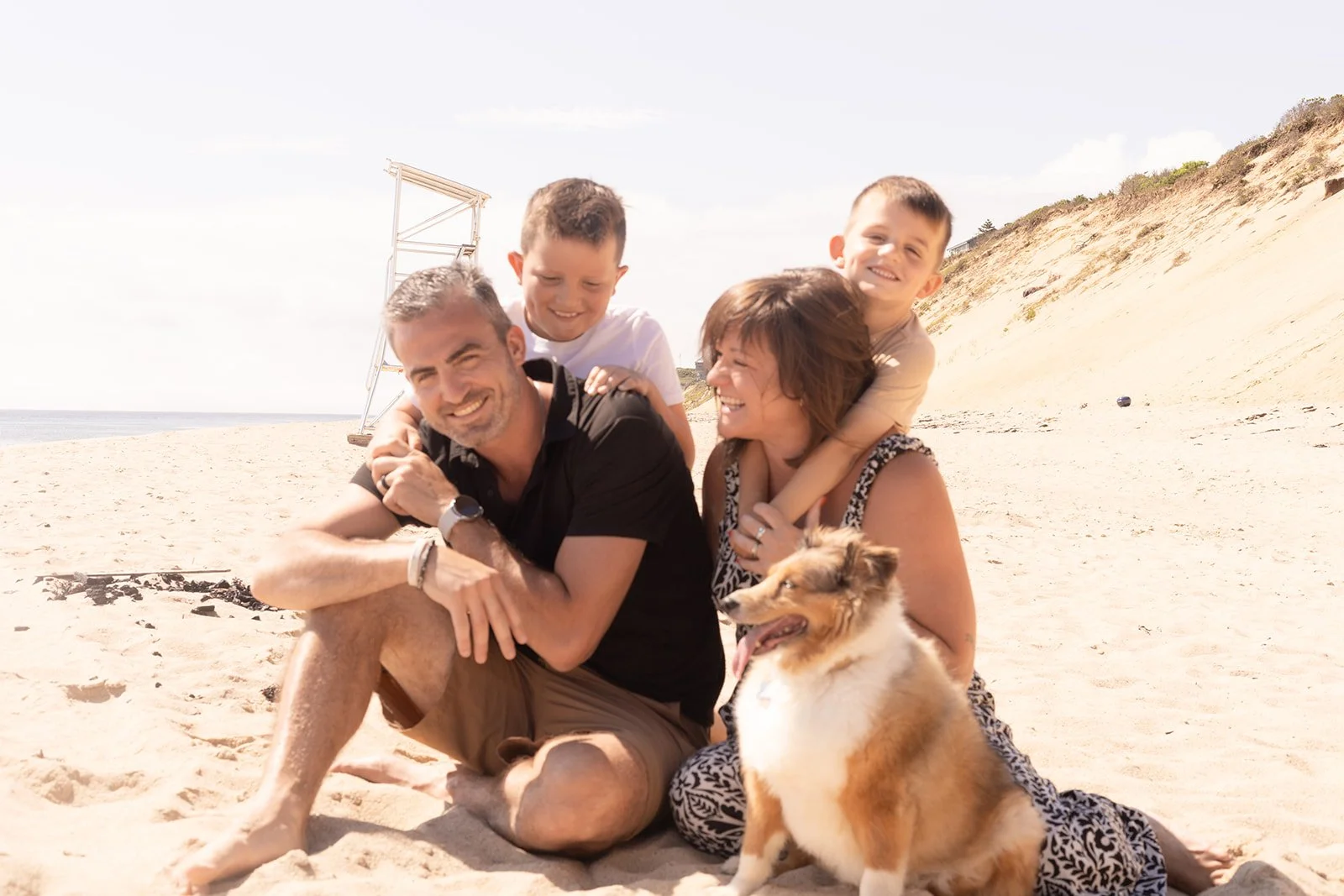 Doylestown PA family on vacation enjoying a Cape Cod beach session with their dog, relaxed and candid photography