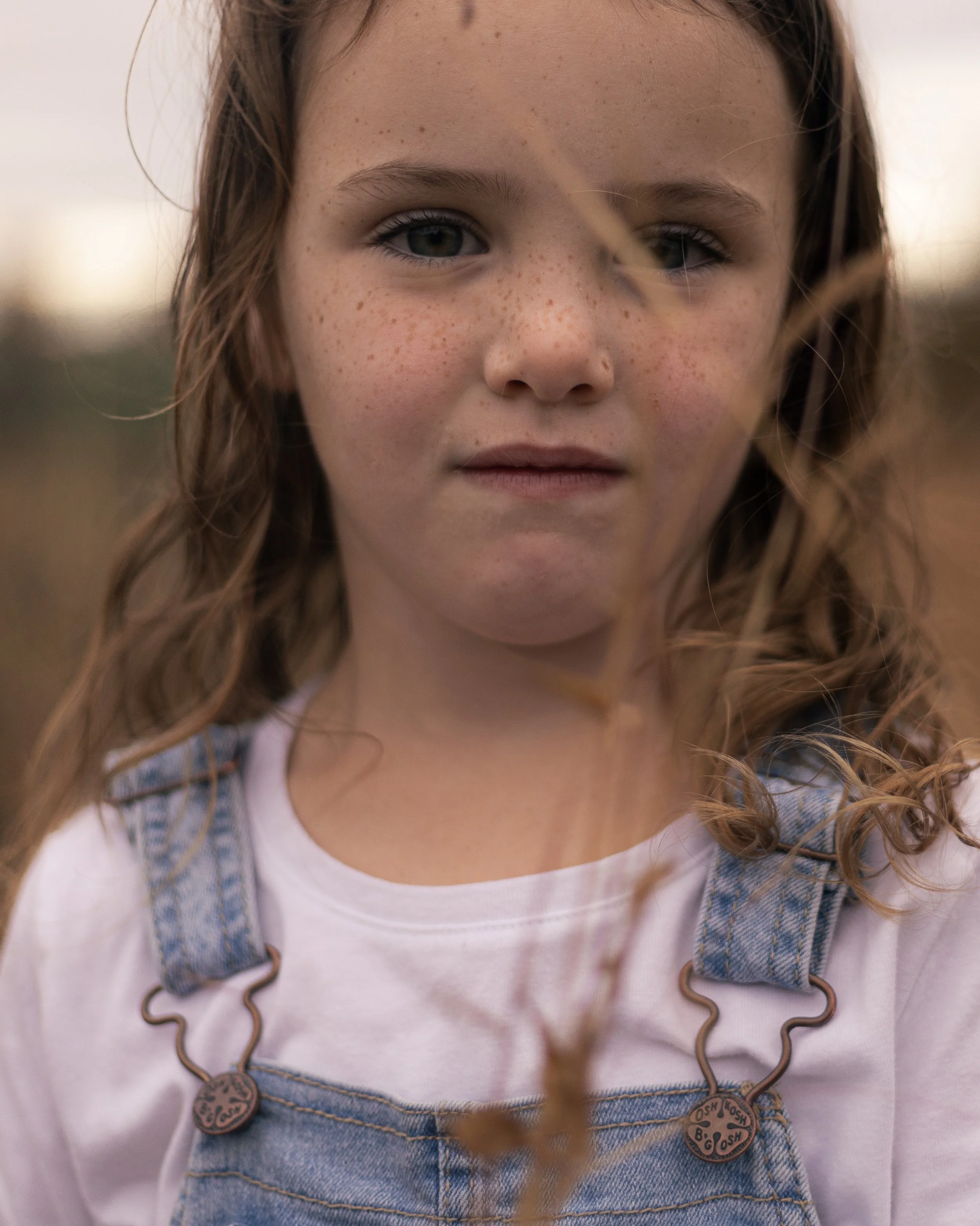 Playful family photography session with children and animals in Doylestown PA, capturing connection and personality