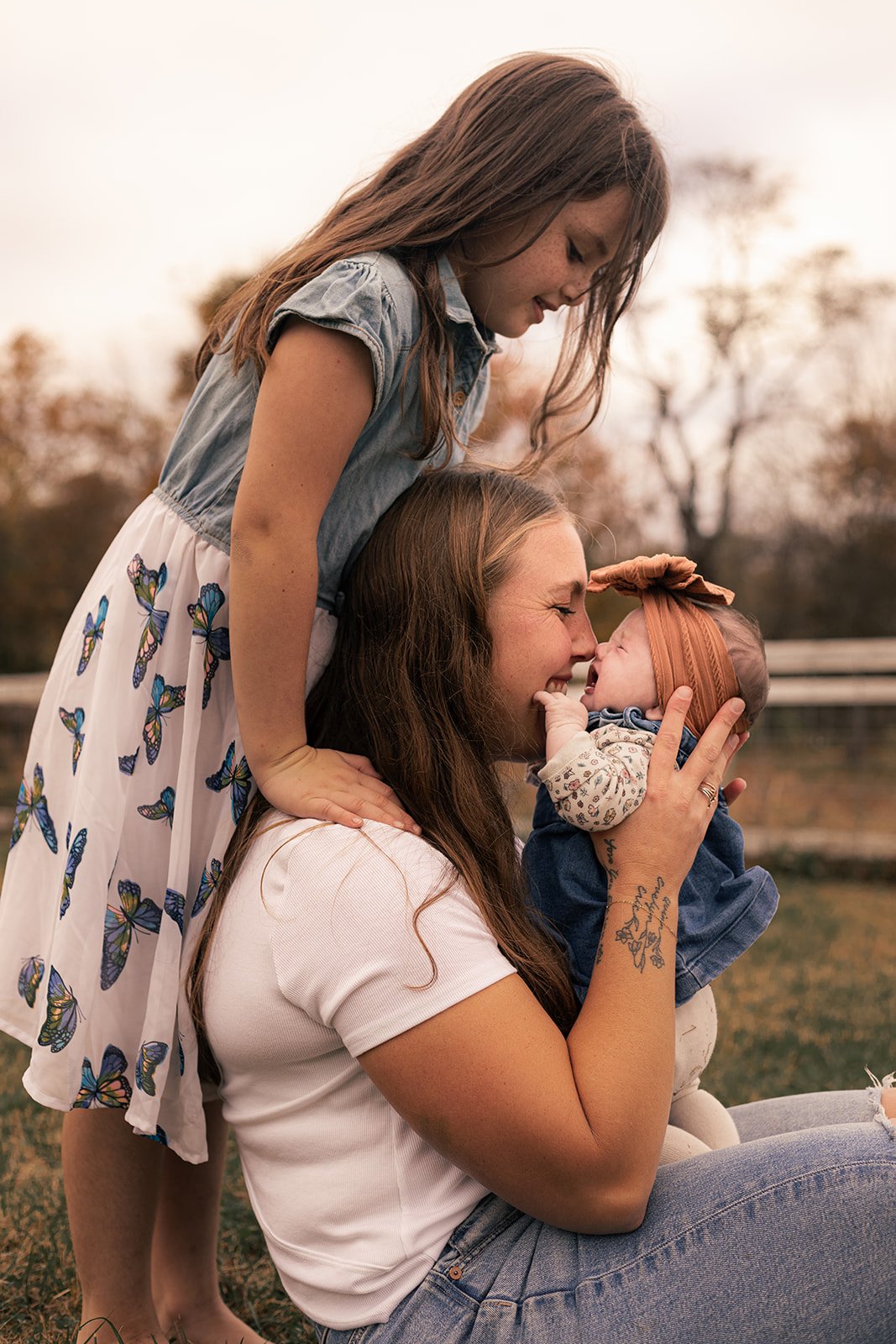 Children running through a garden during a Bucks County family photography session, natural movement and unposed moments