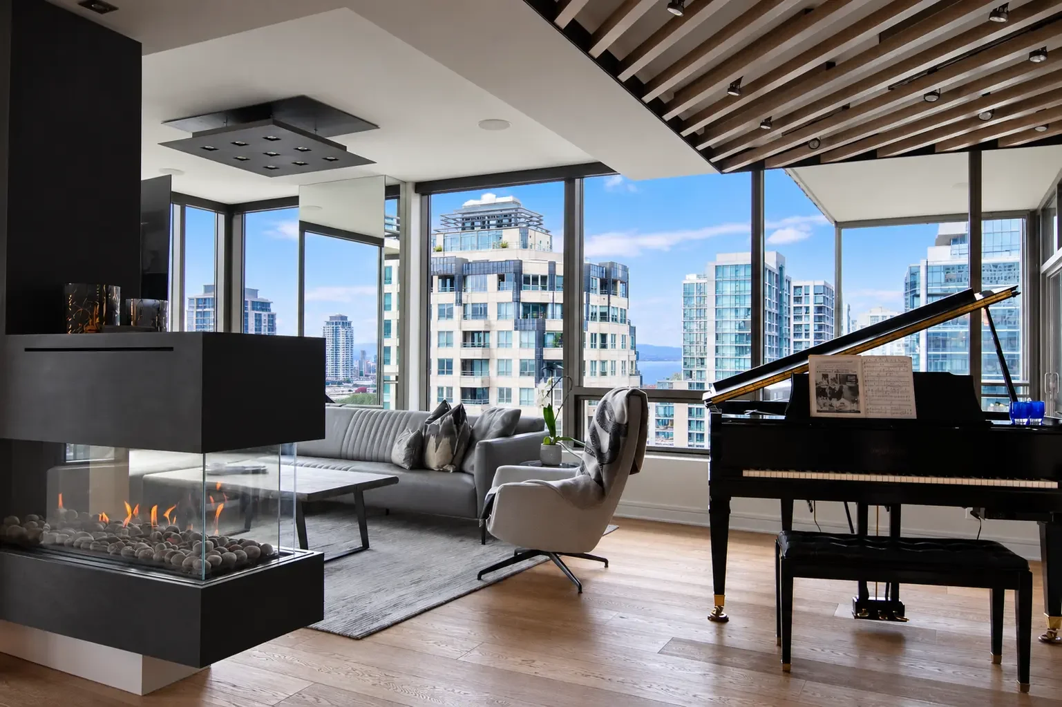 Luxury Living Room with City Skyline View.webp