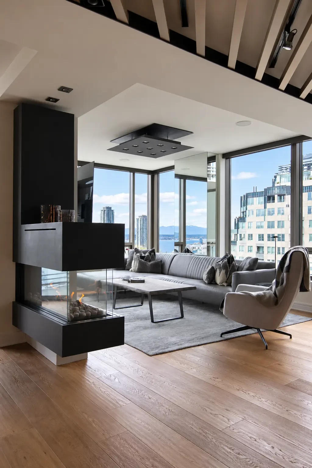 Luxury Condo Living Room with Skyline Views.webp